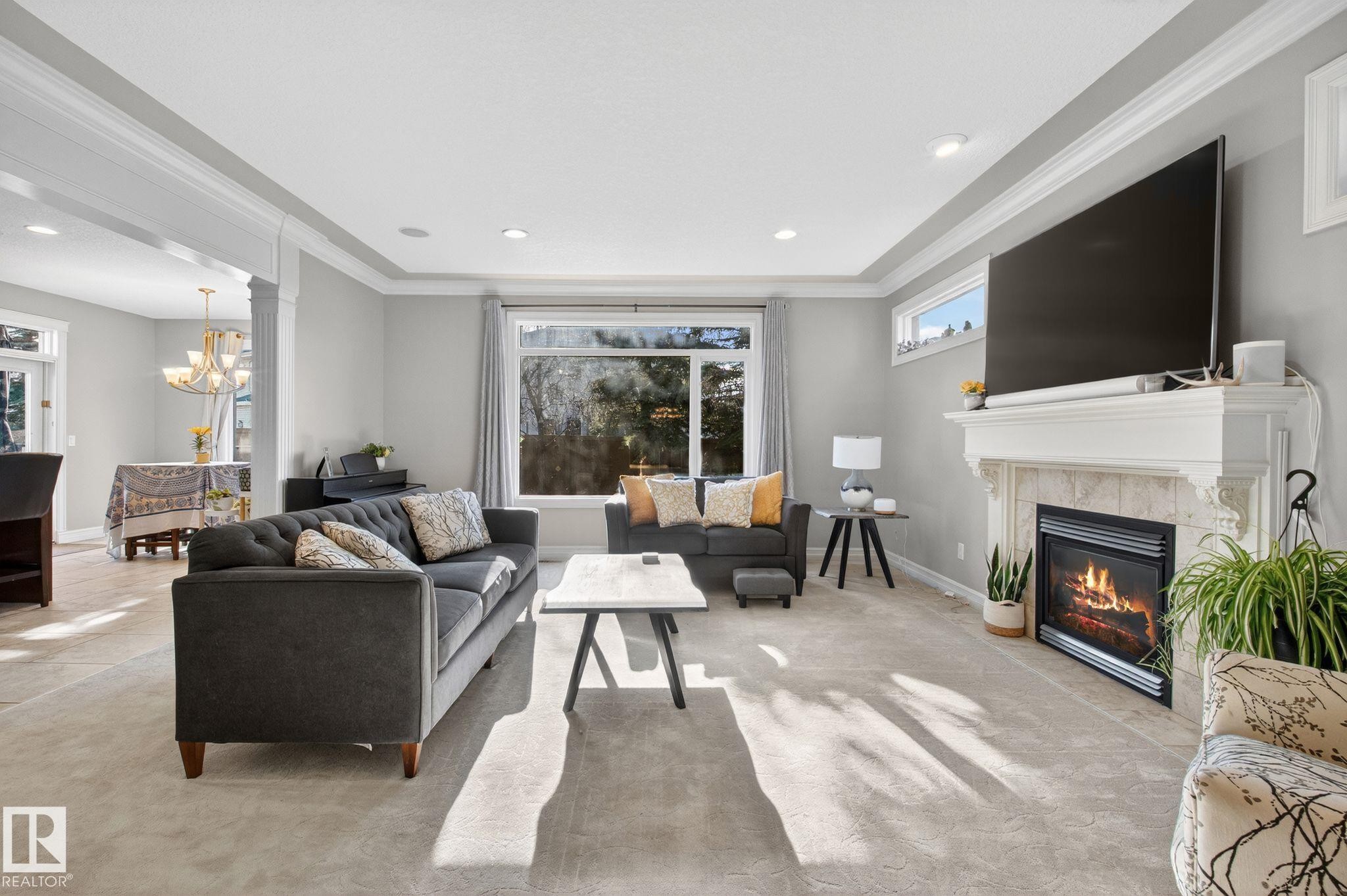 918 Hollingsworth Bend, Edmonton, AB - Indoor Photo Showing Living Room With Fireplace