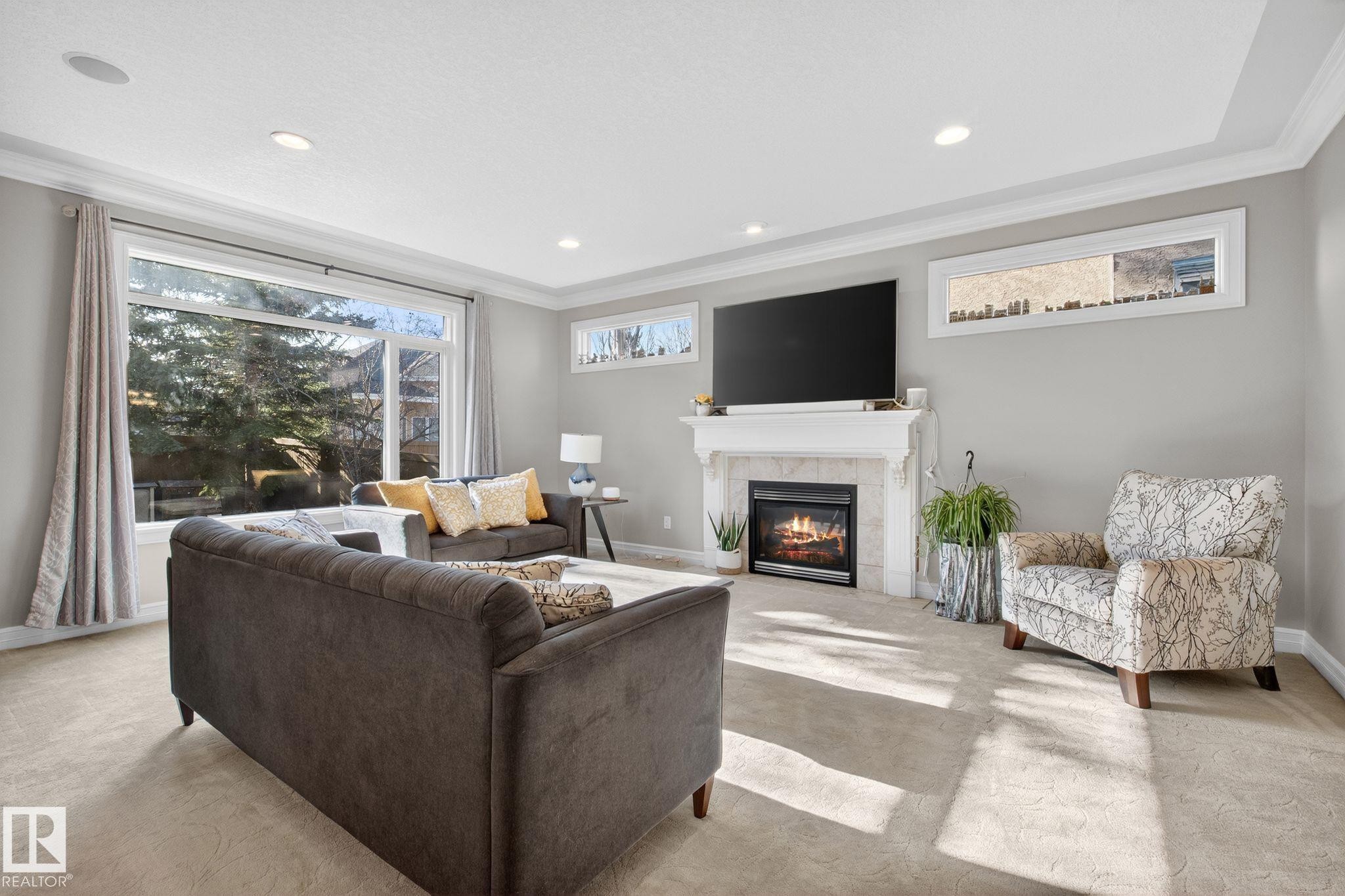 918 Hollingsworth Bend, Edmonton, AB - Indoor Photo Showing Living Room With Fireplace