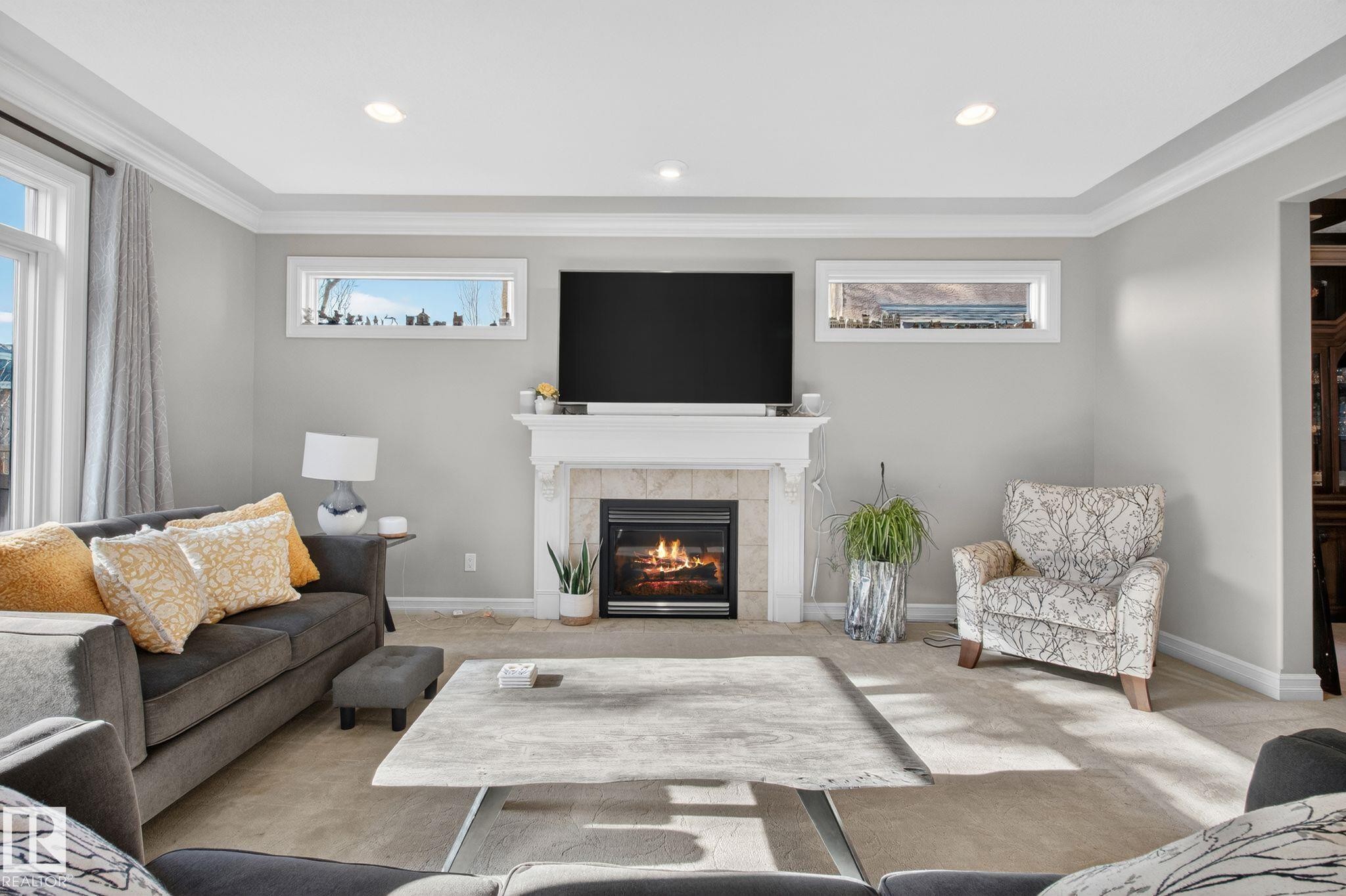 918 Hollingsworth Bend, Edmonton, AB - Indoor Photo Showing Living Room With Fireplace