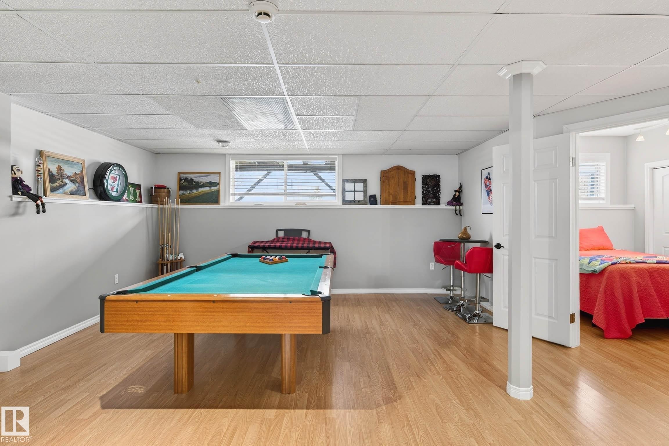 Recreation room featuring light-colored flooring, a pool table, and a window providing natural light - 34 Donald Place, St. Albert, AB - Indoor Photo Showing Other Room