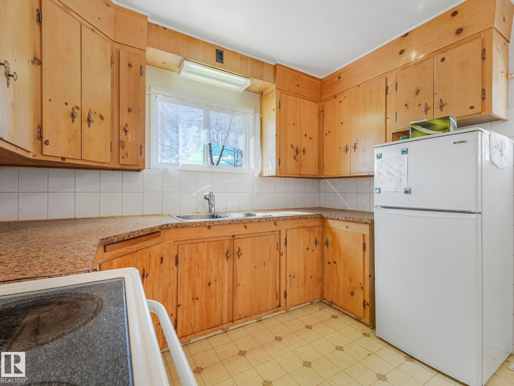 12245 96 Street, Edmonton, AB - Indoor Photo Showing Kitchen With Double Sink