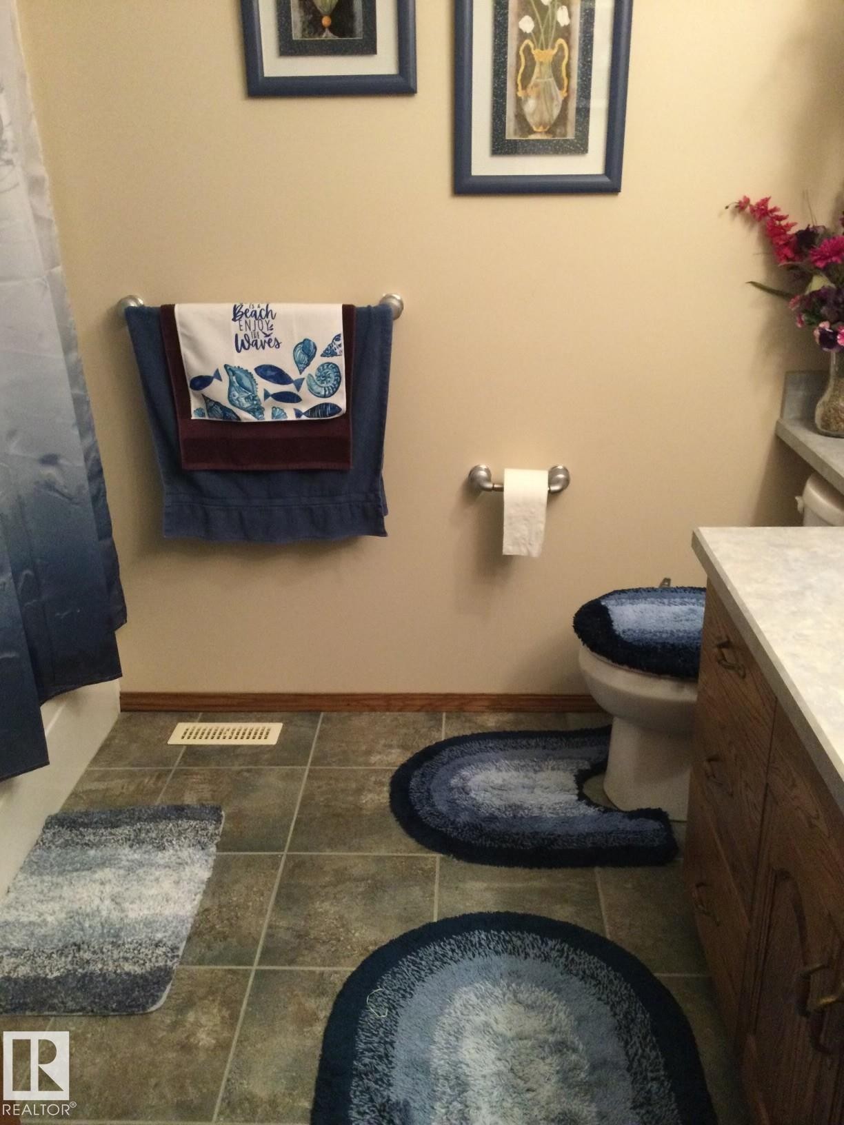 Bathroom featuring neutral wall paint and tile flooring - 123064 Hwy 45, Rural Two Hills County, AB