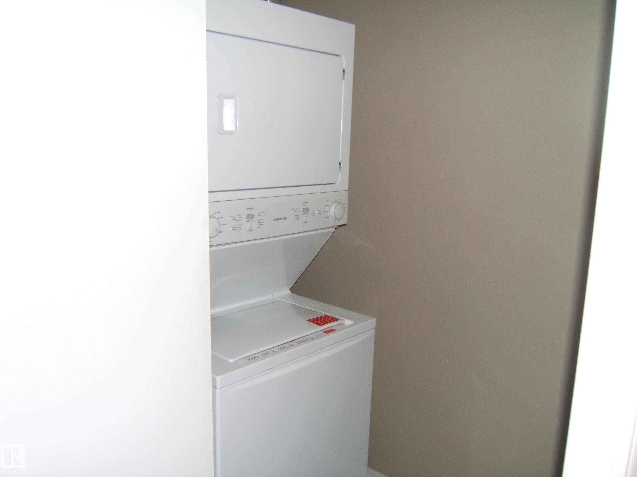 Image quality insufficient for description - 105 11214 80 Street, Edmonton, AB - Indoor Photo Showing Laundry Room