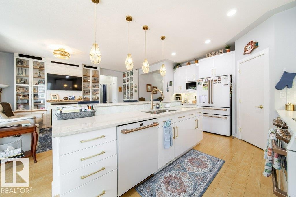 8731 85 Avenue, Edmonton, AB - Indoor Photo Showing Kitchen With Double Sink