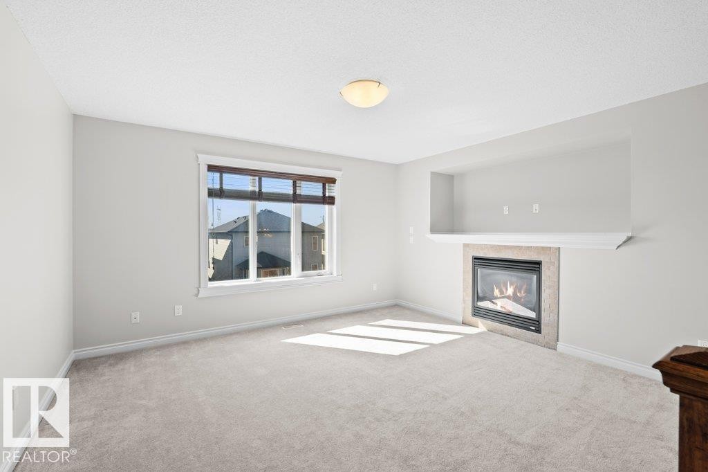 5871 166 Avenue, Edmonton, AB - Indoor Photo Showing Living Room With Fireplace