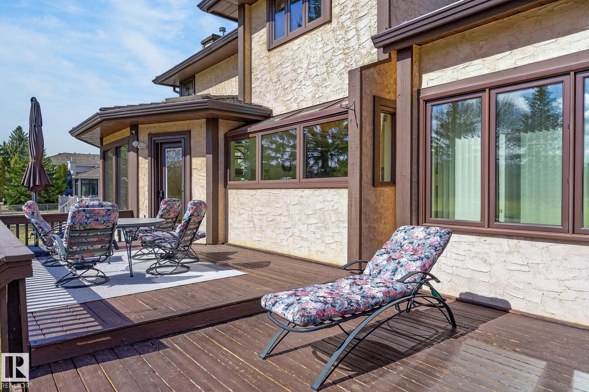 Spacious exterior deck featuring wood-finish flooring - 848 Wheeler Road W, Edmonton, AB - Outdoor With Deck Patio Veranda With Exterior