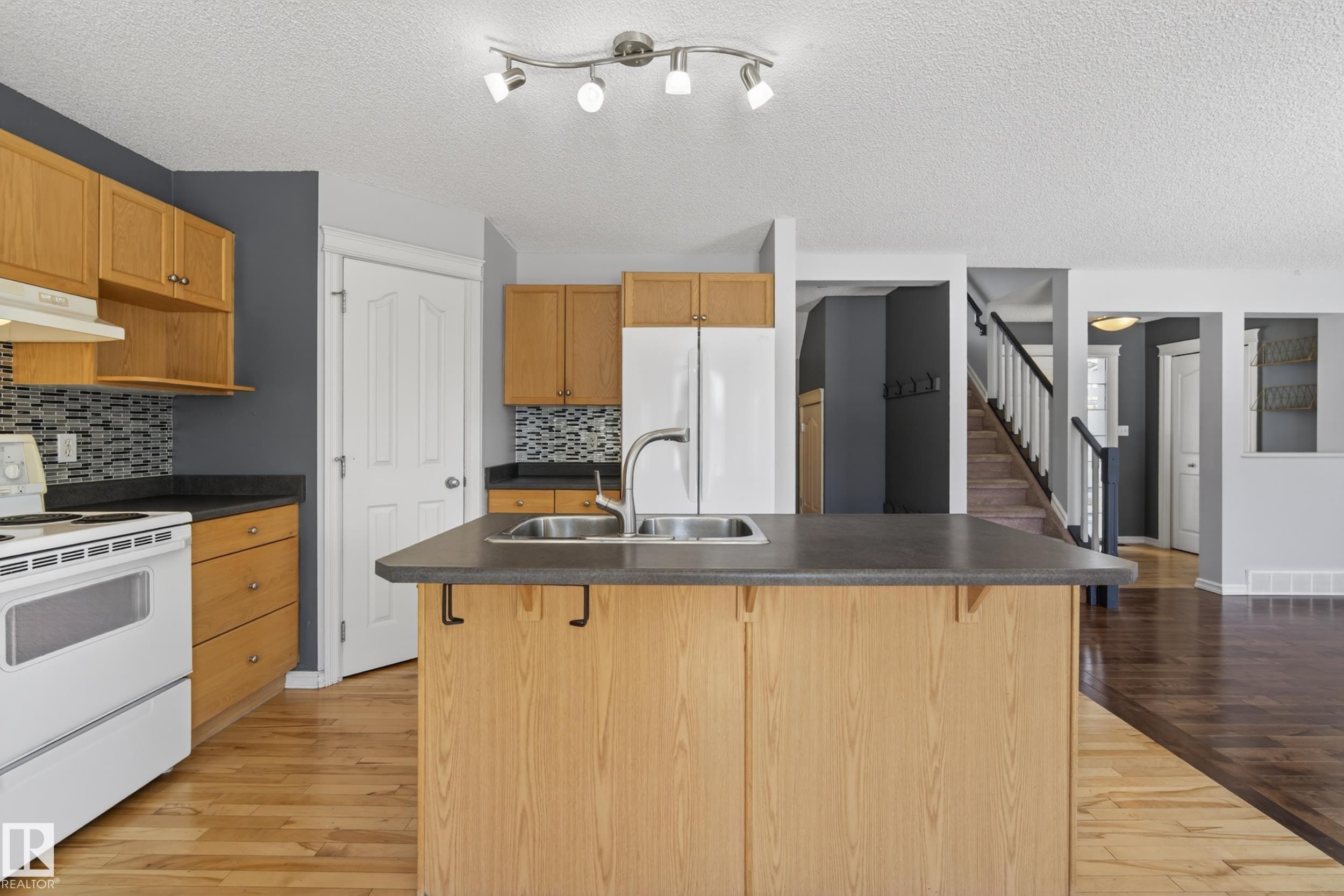 8915 7 Avenue, Edmonton, AB - Indoor Photo Showing Kitchen With Double Sink