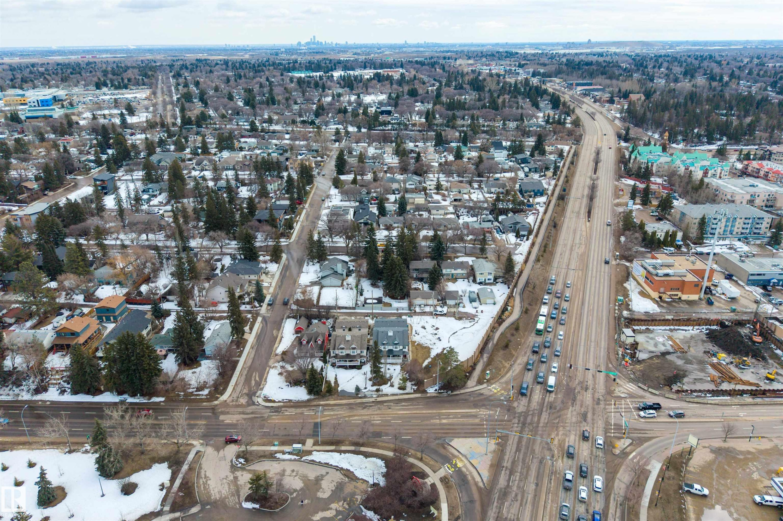 Aerial view showcasing the residential neighbourhood with numerous trees and a main thoroughfare - 2 Sturgeon Road, St. Albert, AB - Outdoor With View