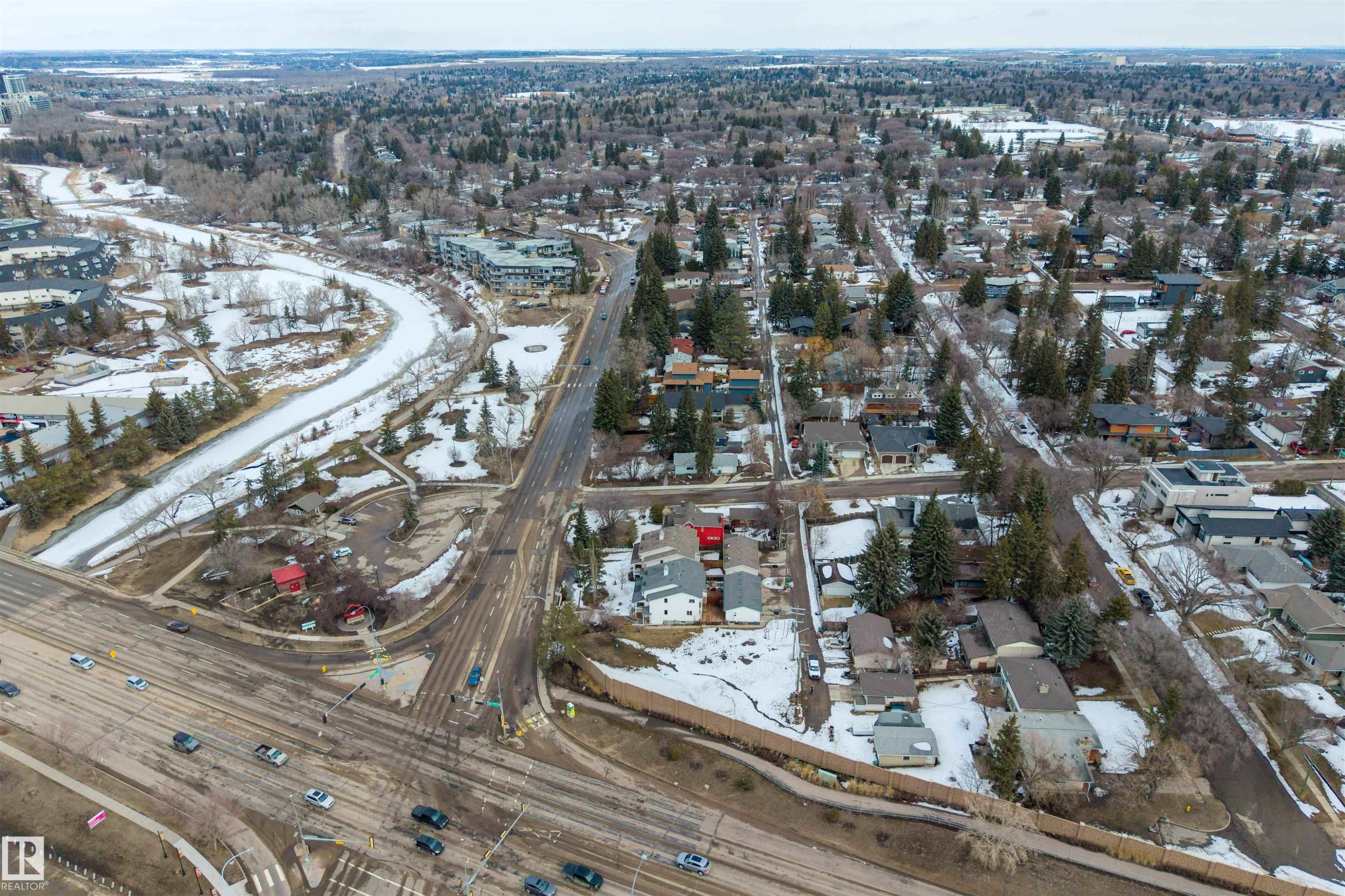 This aerial view showcases a vibrant community with a mix of residential properties and natural landscapes - 2 Sturgeon Road, St. Albert, AB - Outdoor With View
