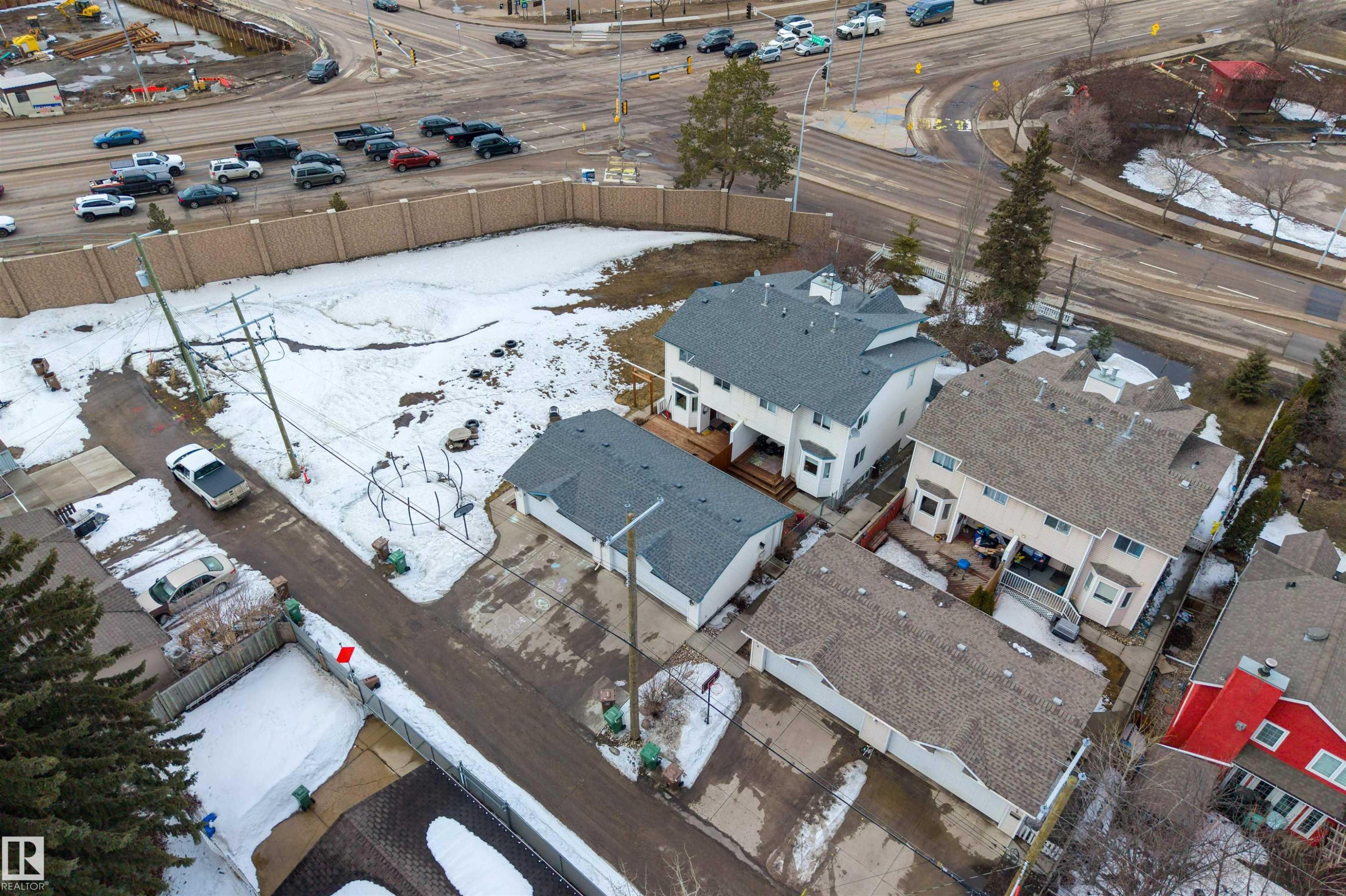 The property features a detached garage and a fenced yard - 2 Sturgeon Road, St. Albert, AB - Outdoor With View