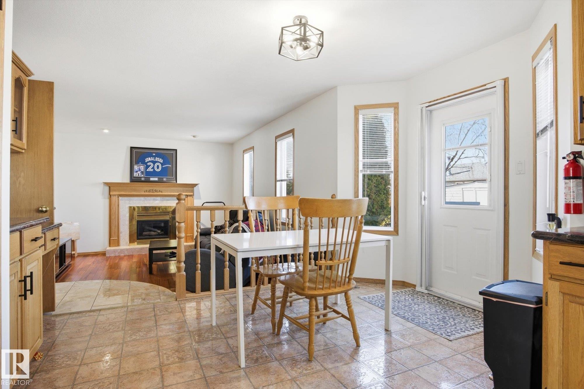 7220 157 Avenue, Edmonton, AB - Indoor Photo Showing Dining Room With Fireplace