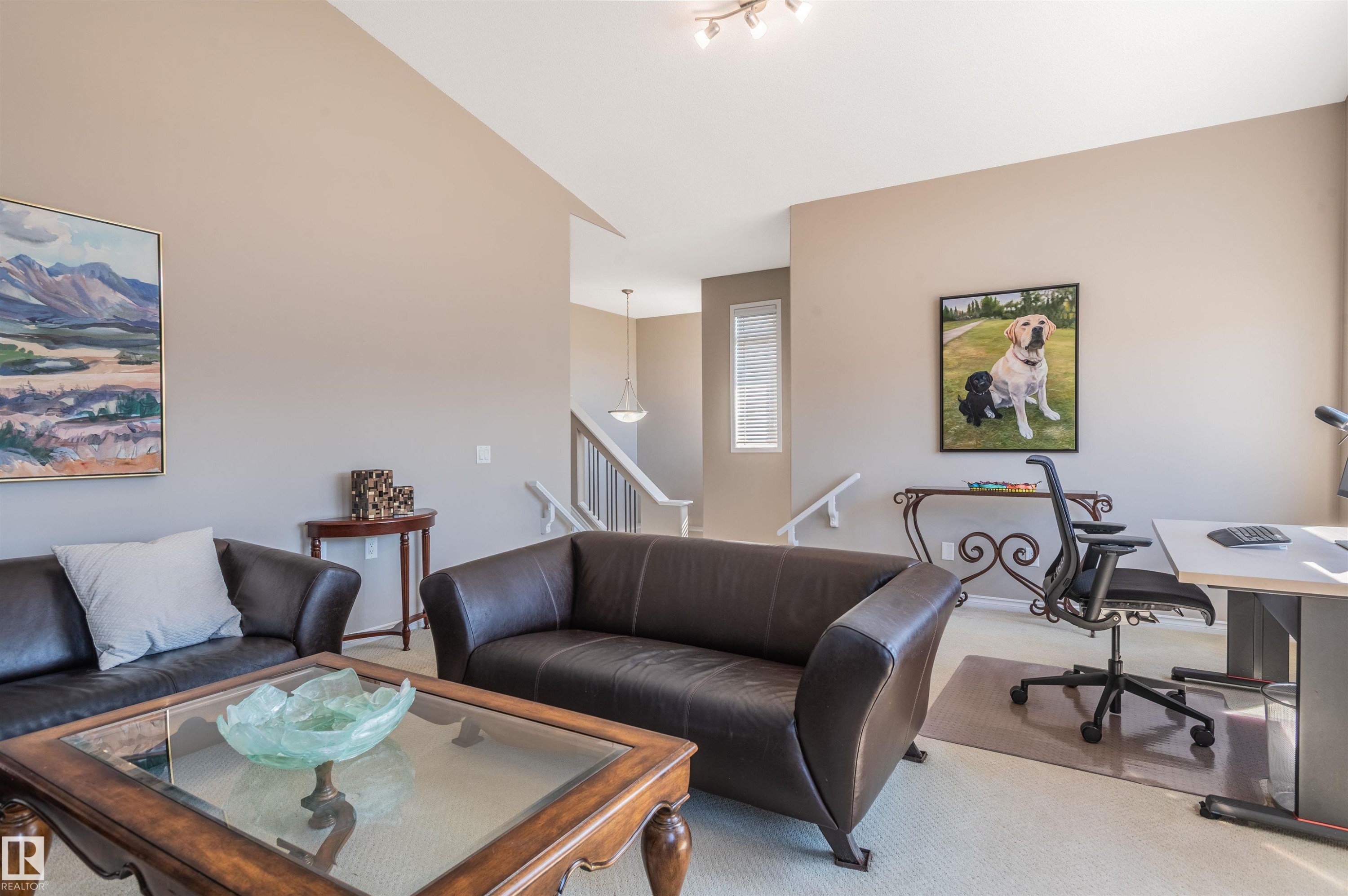 Spacious living area featuring neutral wall tones and carpeted flooring - 121 Ellington Crescent, St. Albert, AB - Indoor Photo Showing Living Room