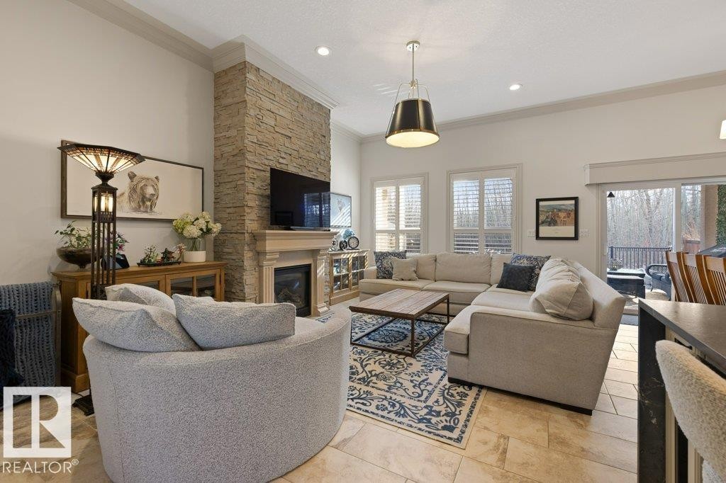 68 Enchanted Way, St. Albert, AB - Indoor Photo Showing Living Room With Fireplace