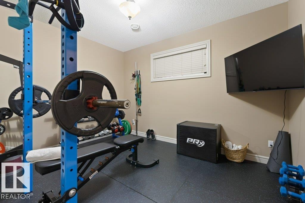 68 Enchanted Way, St. Albert, AB - Indoor Photo Showing Gym Room