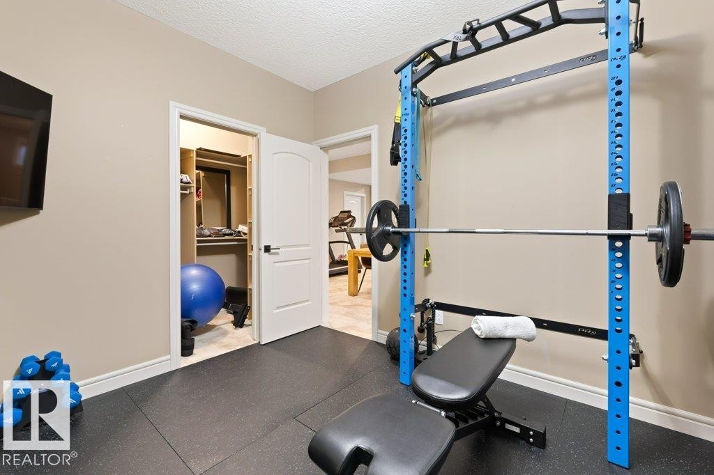 68 Enchanted Way, St. Albert, AB - Indoor Photo Showing Gym Room