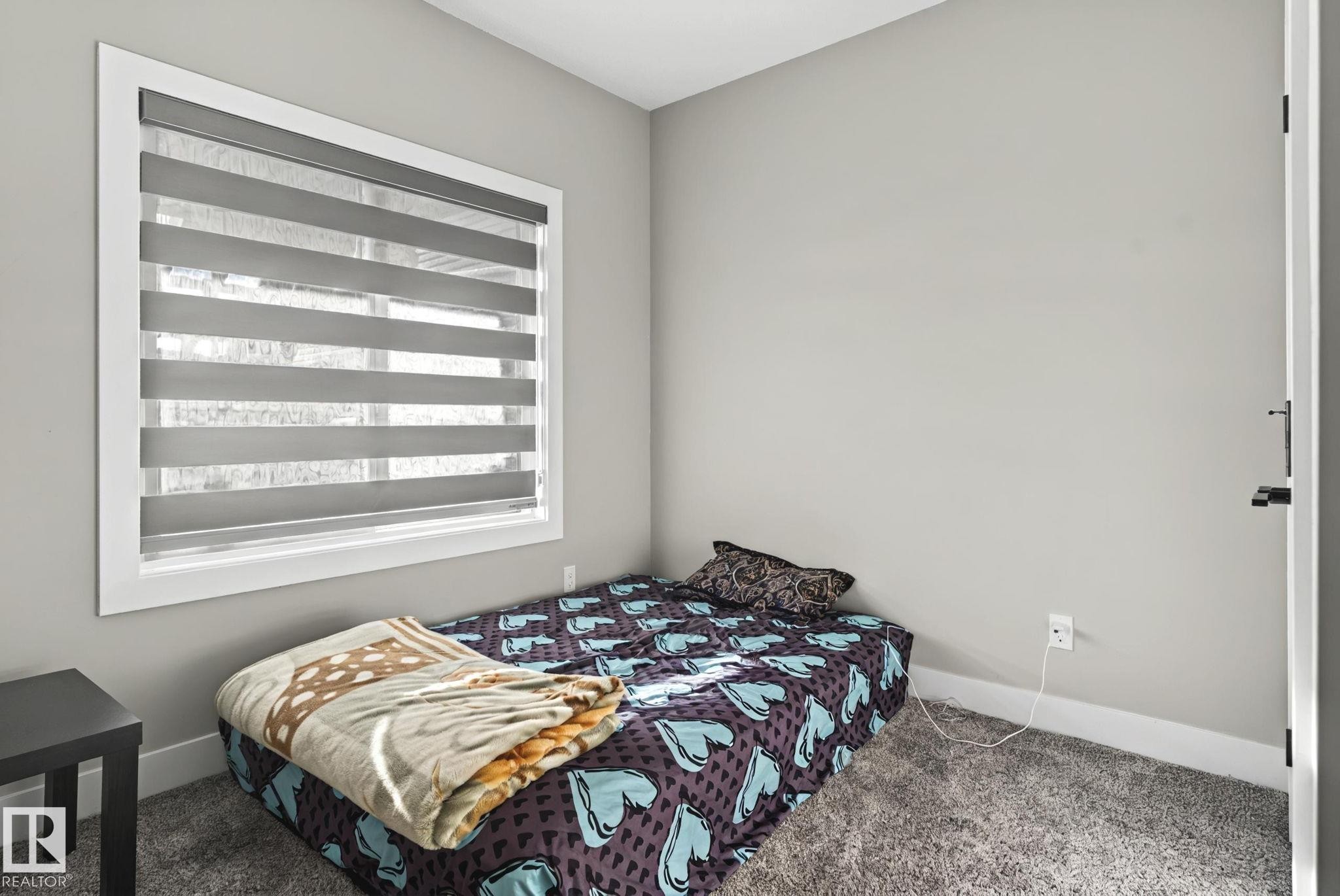 4119 7 Avenue, Edmonton, AB - Indoor Photo Showing Bedroom