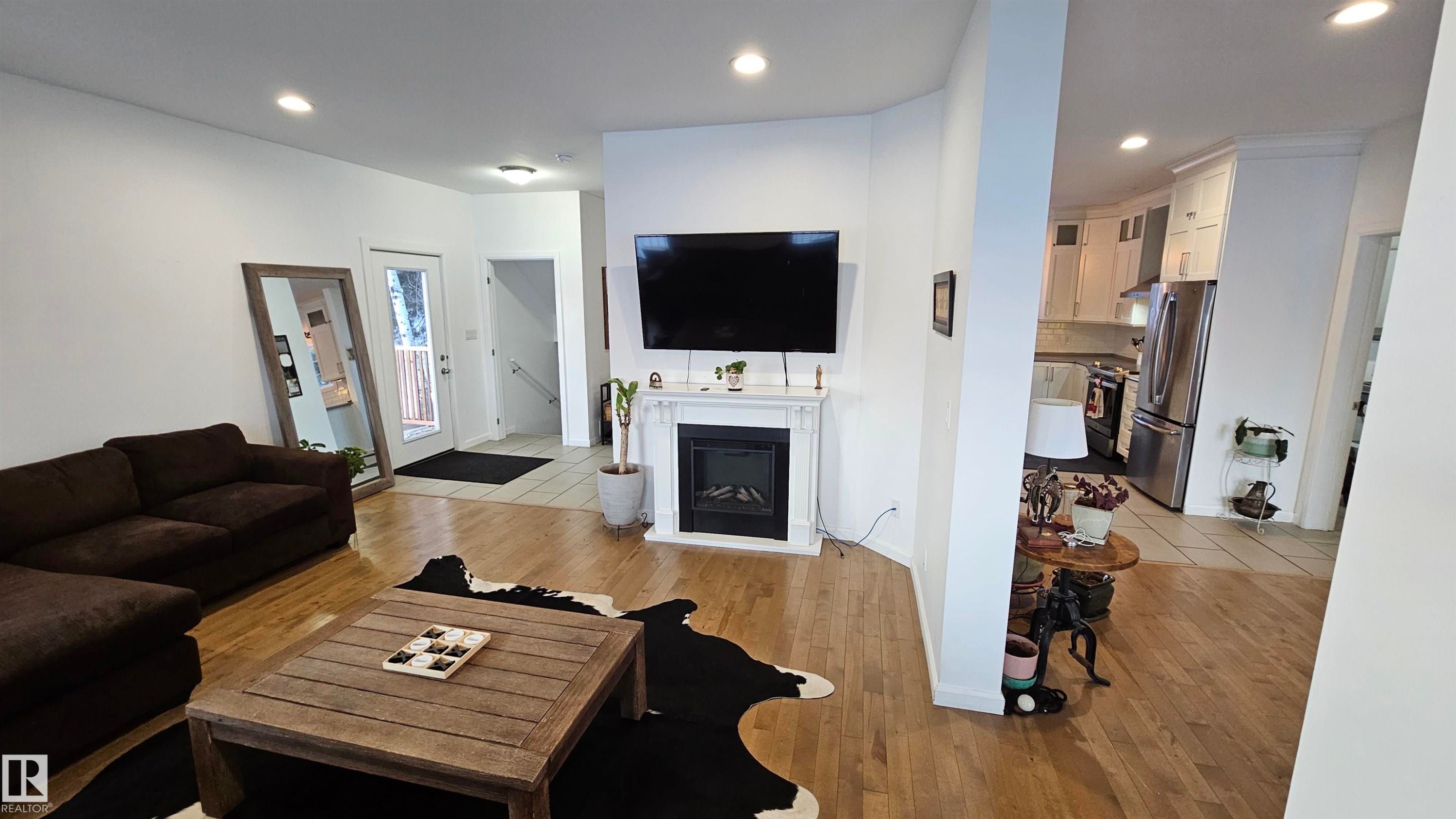 58513 Range Road 231, Rural Thorhild County, AB - Indoor Photo Showing Living Room With Fireplace