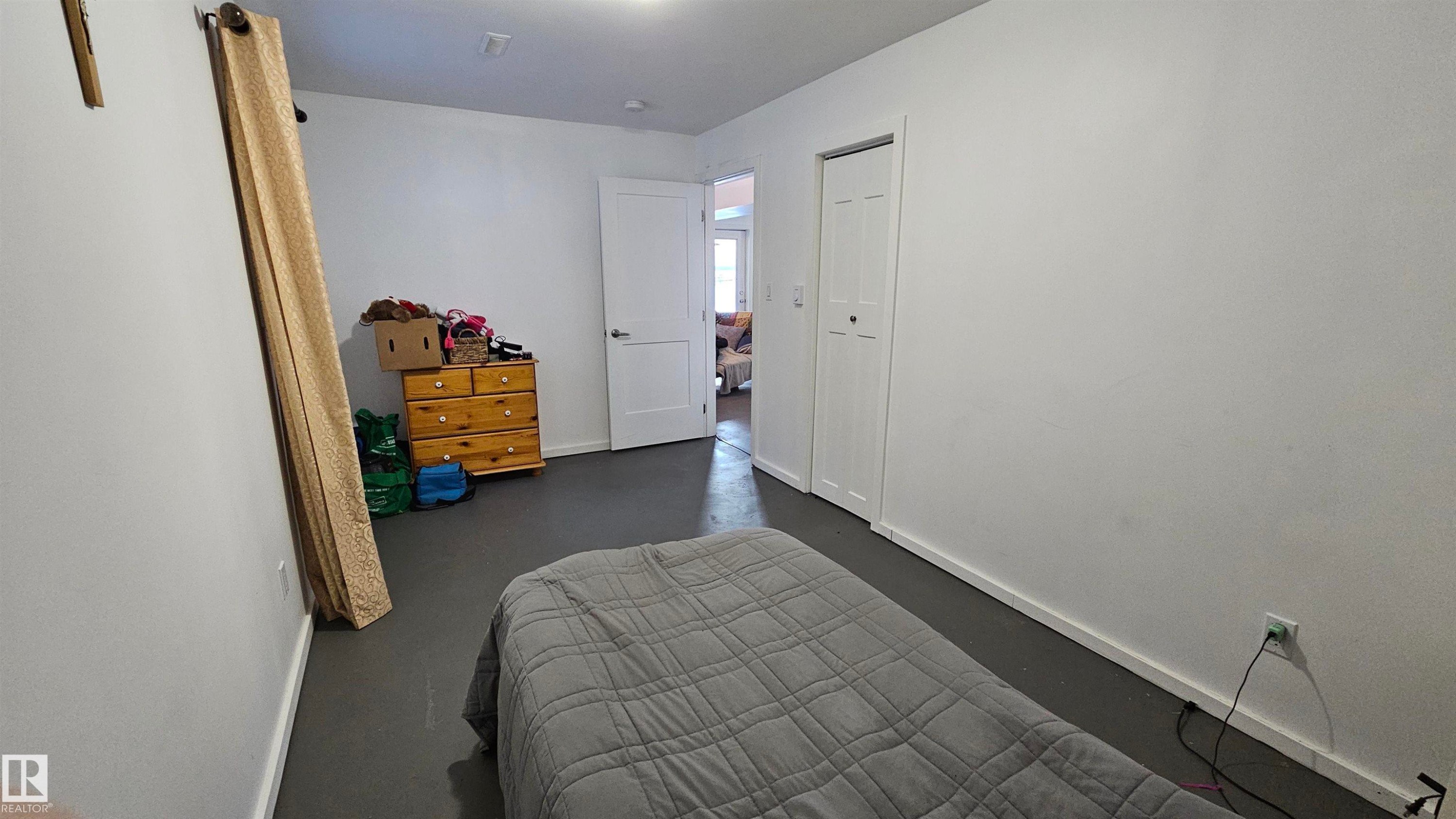 4th bedroom - in walkout basement - 58513 Range Road 231, Rural Thorhild County, AB - Indoor Photo Showing Bedroom