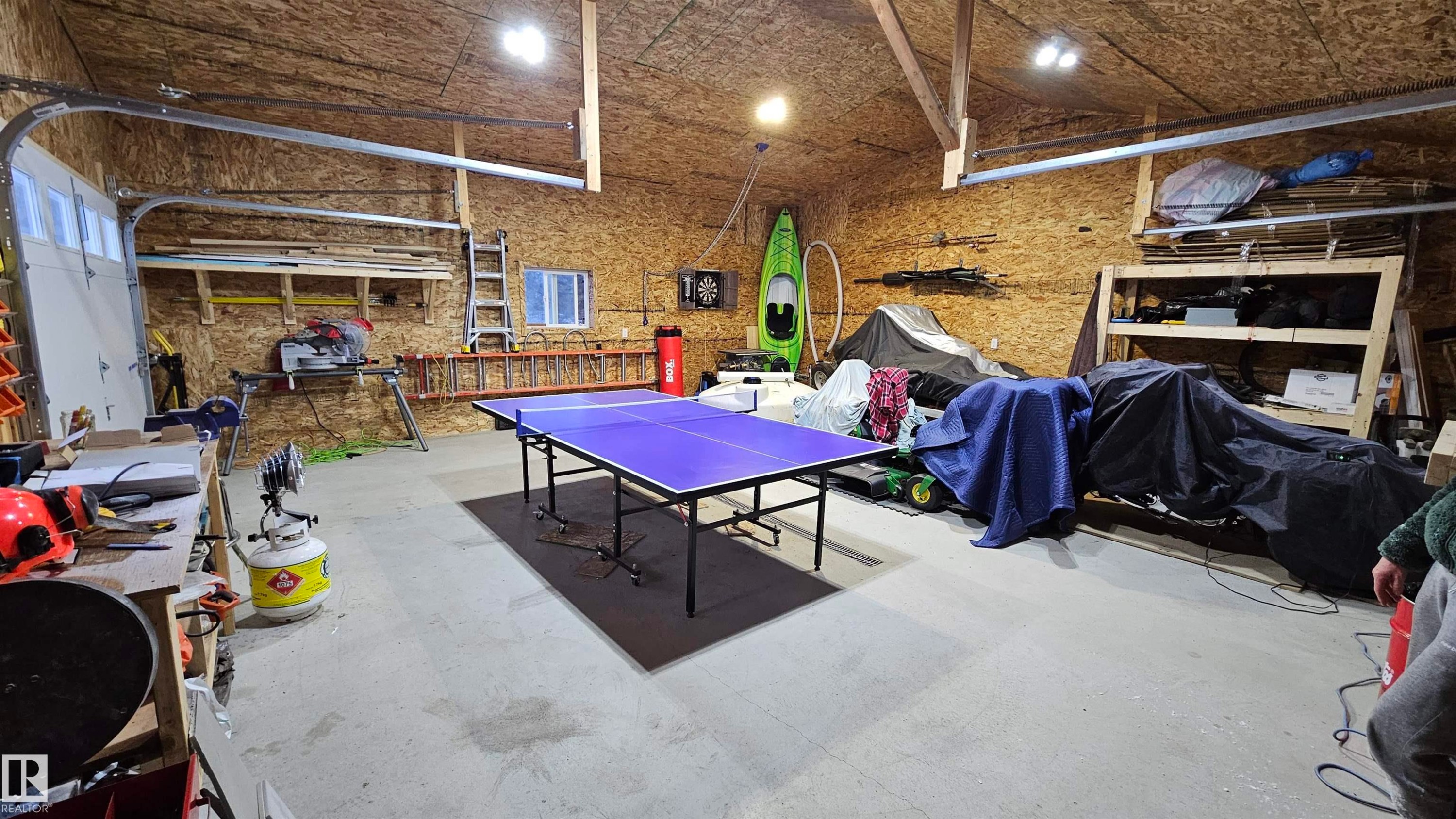 26x26 Oversized garage with in floor heat, 2 overhead doors and floor drain - 58513 Range Road 231, Rural Thorhild County, AB - Indoor