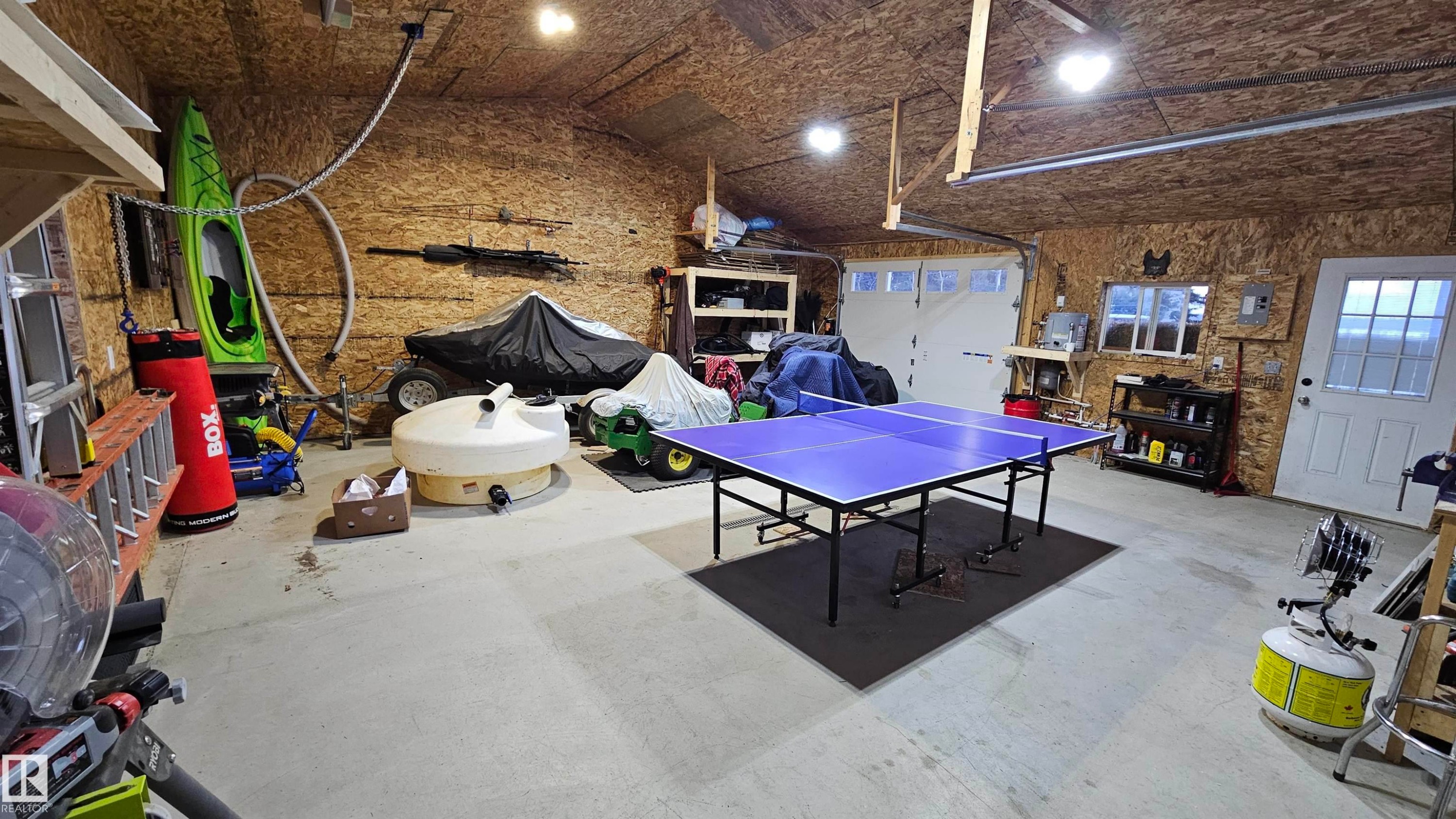 26x26 Oversized garage with in floor heat, 2 overhead doors and floor drain - 58513 Range Road 231, Rural Thorhild County, AB - Indoor Photo Showing Other Room