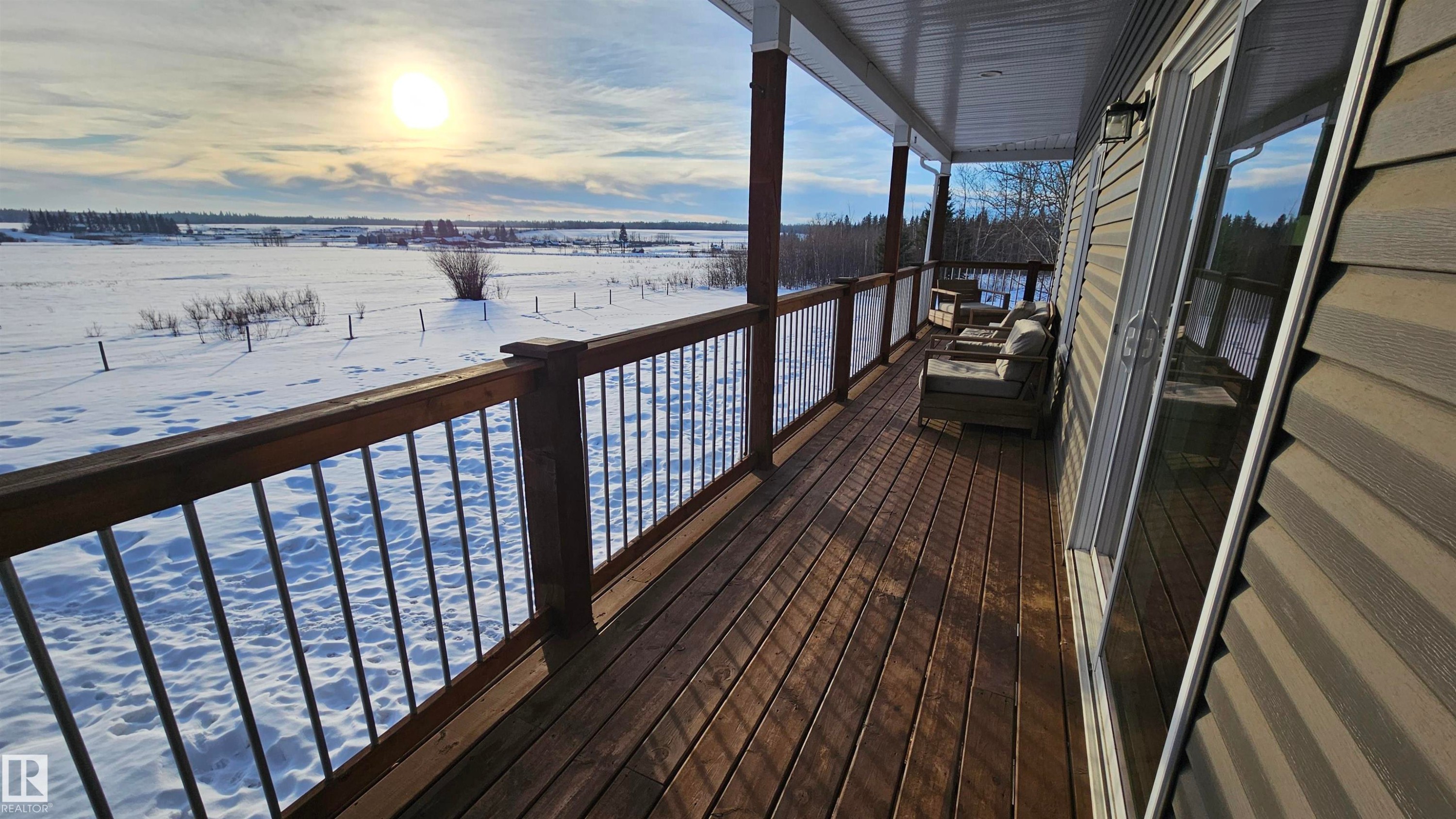 East, South and West wraparound deck with amazing views. - 58513 Range Road 231, Rural Thorhild County, AB - Outdoor With View With Exterior