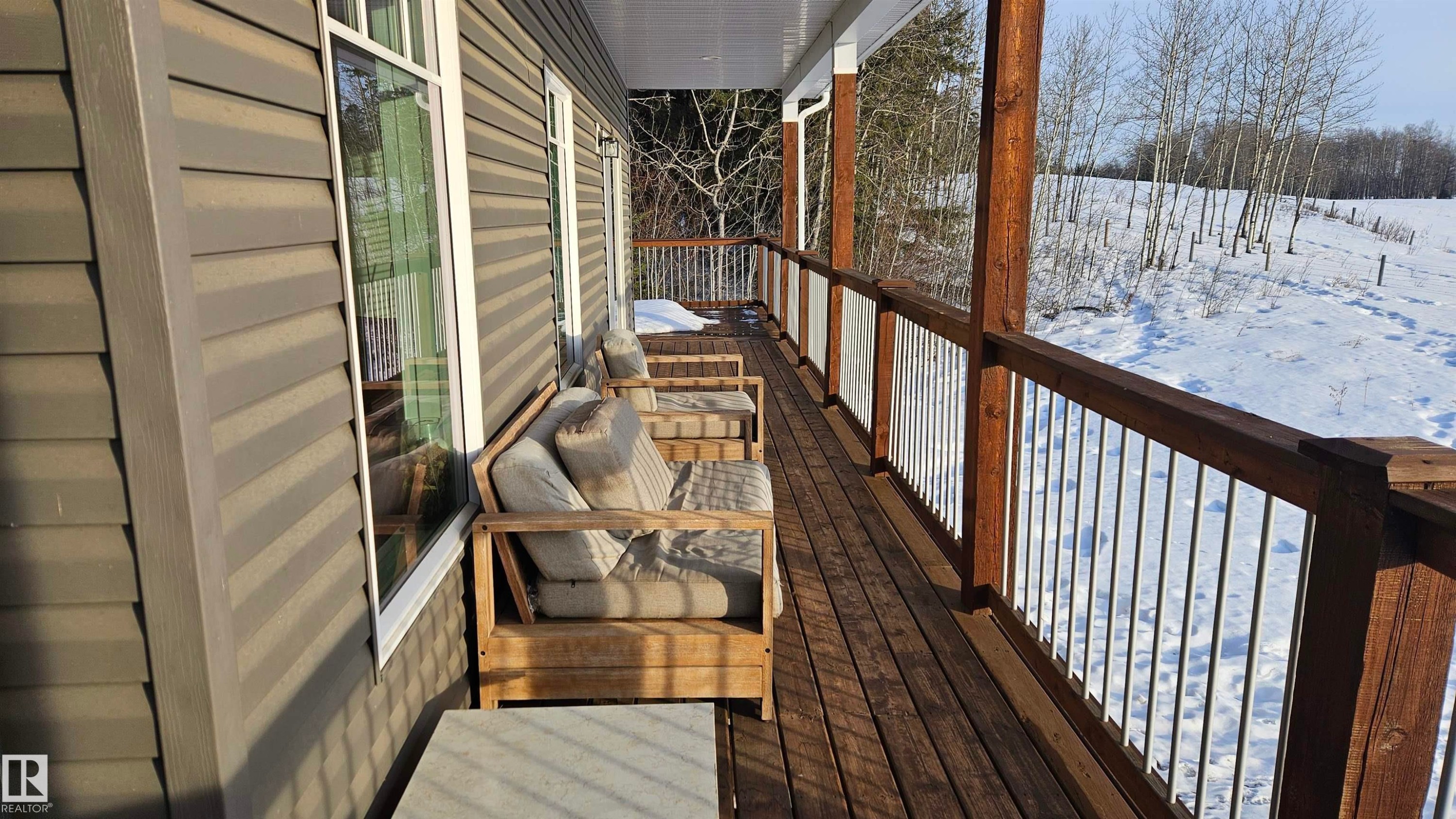 East, South and West wraparound deck with amazing views. - 58513 Range Road 231, Rural Thorhild County, AB - Outdoor With Exterior