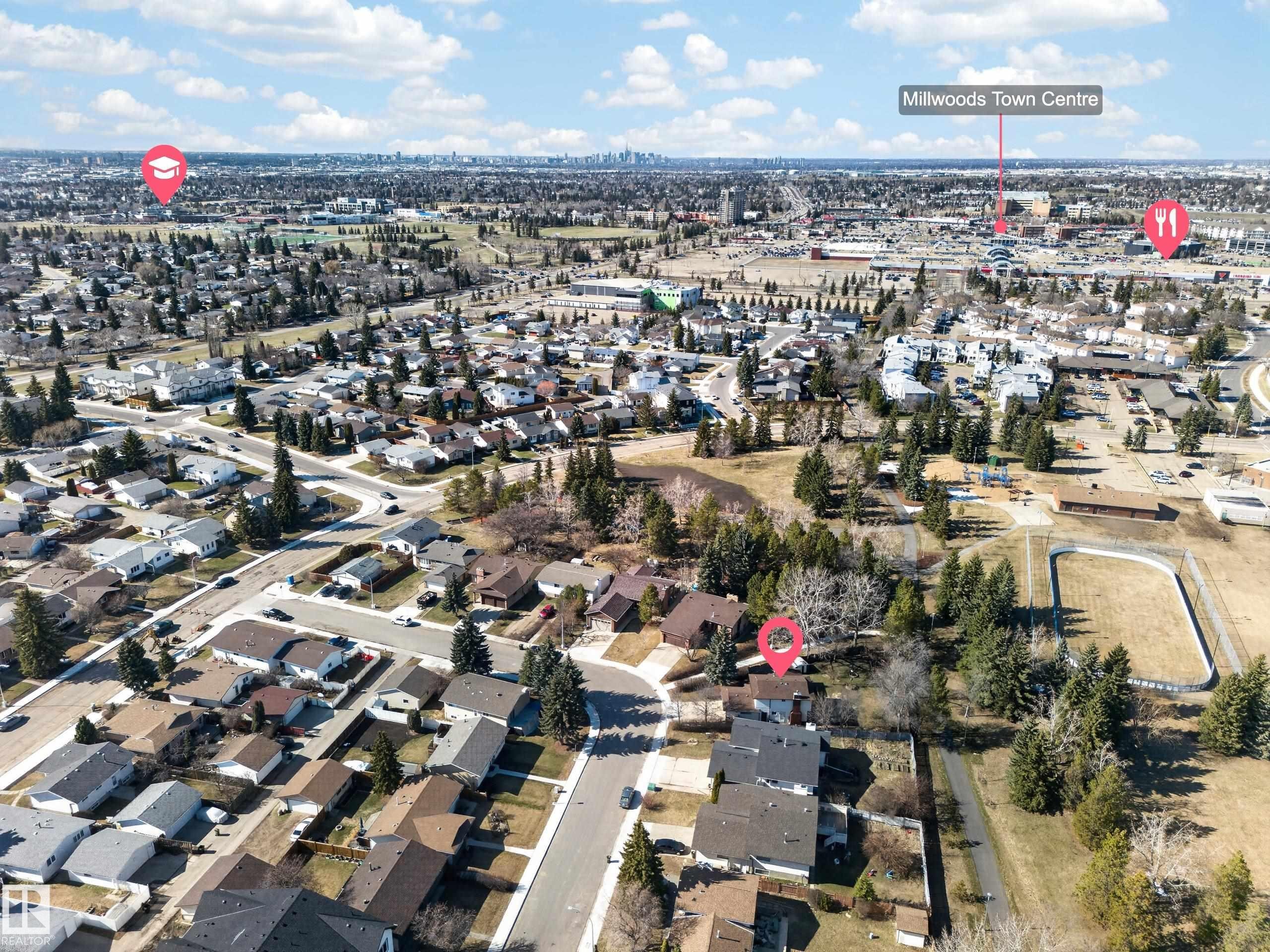 Aerial perspective showcasing the residential neighborhood with a variety of single-family homes and mature trees - 1767 61 Street, Edmonton, AB - Outdoor With View