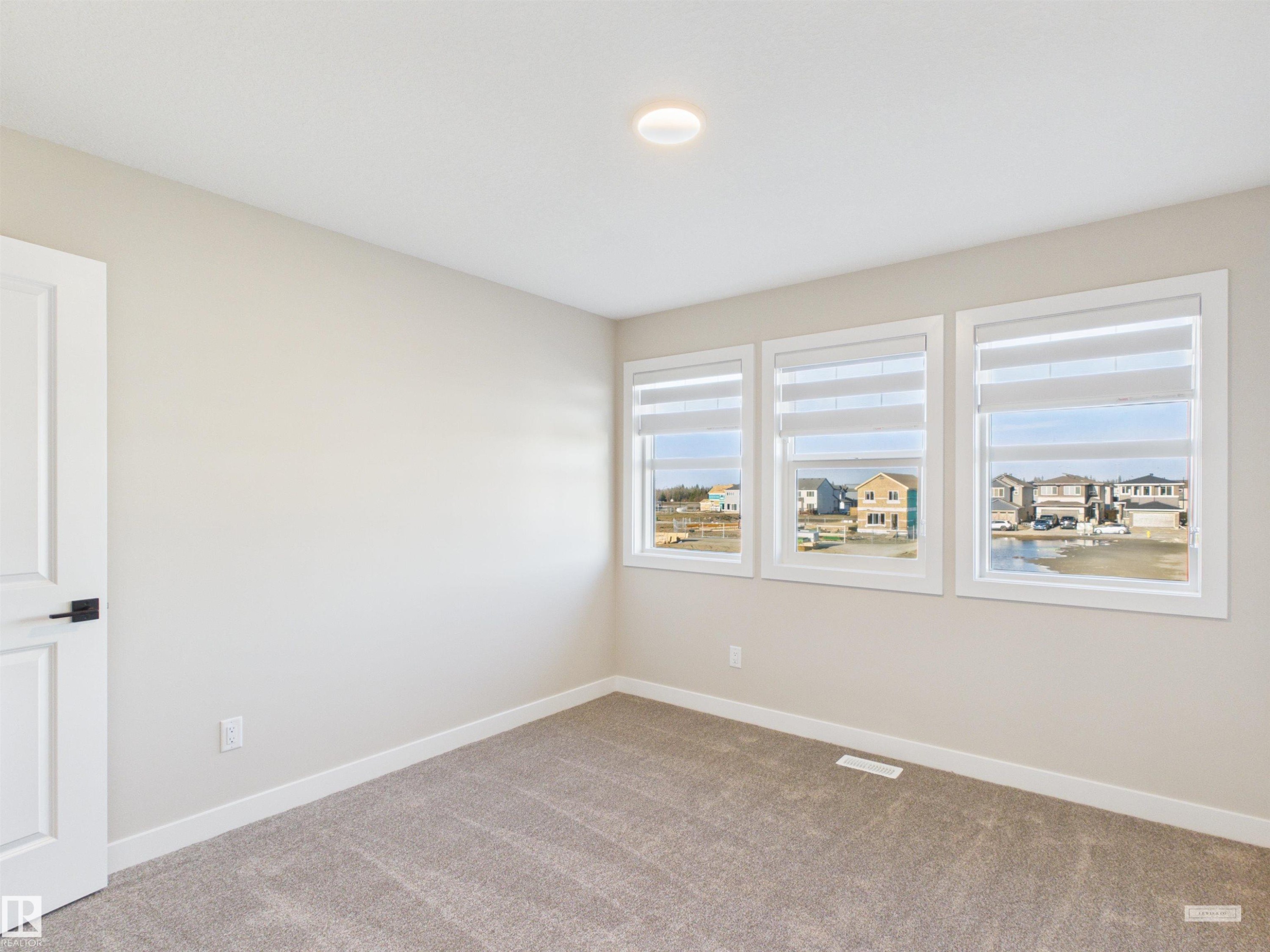 3 Emerson Landing, Spruce Grove, AB - Indoor Photo Showing Other Room