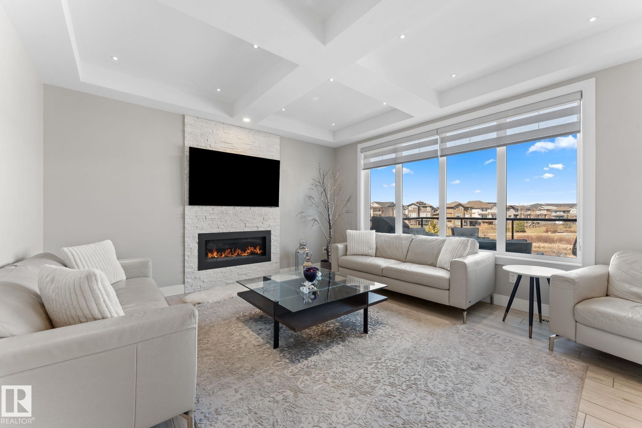 7640 179 Avenue, Edmonton, AB - Indoor Photo Showing Living Room With Fireplace