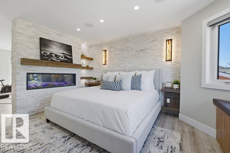 439 Rooney Crescent, Edmonton, AB - Indoor Photo Showing Bedroom With Fireplace