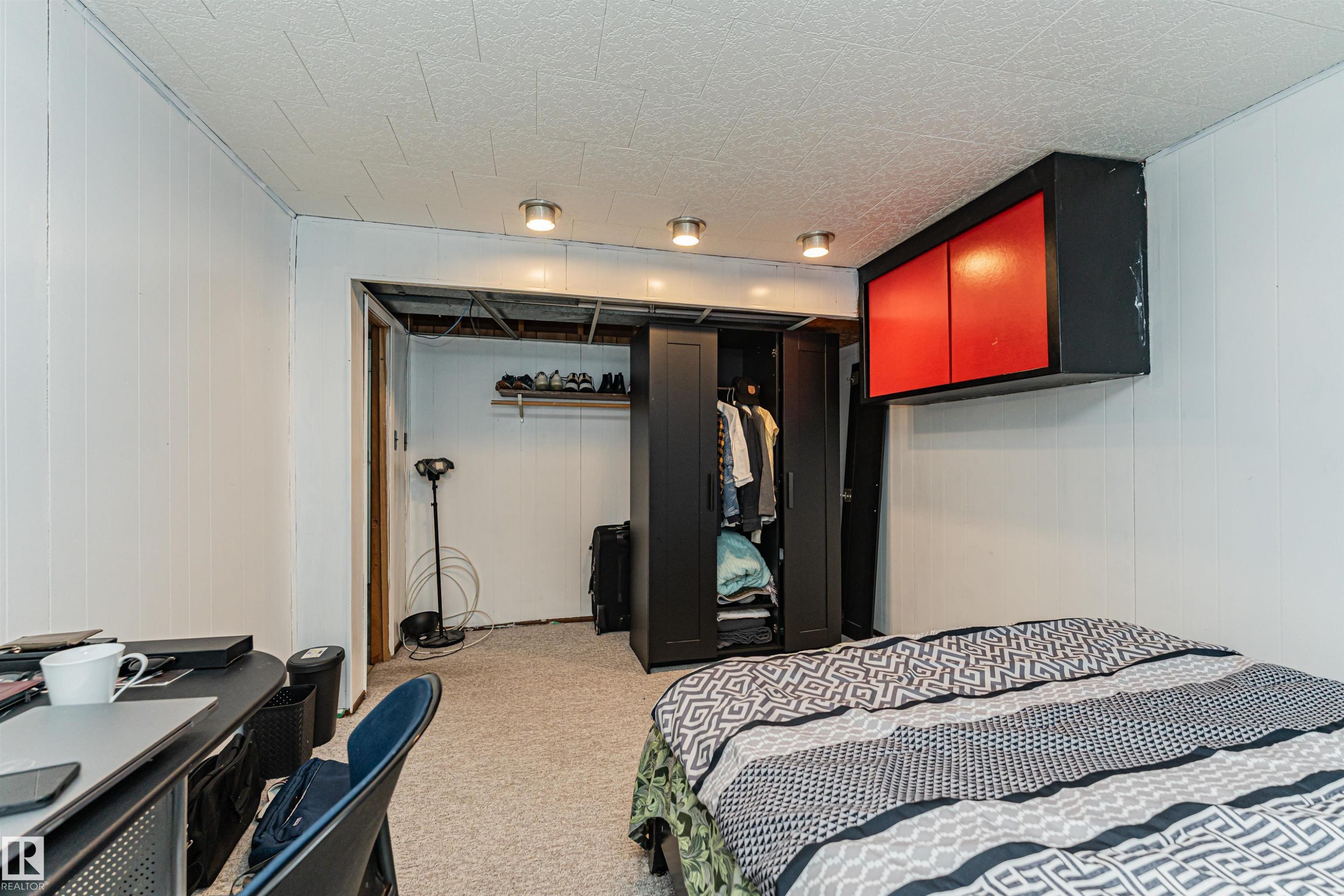 This room features white paneled walls, recessed lighting, and carpeting - 10412 39 Avenue, Edmonton, AB - Indoor Photo Showing Bedroom