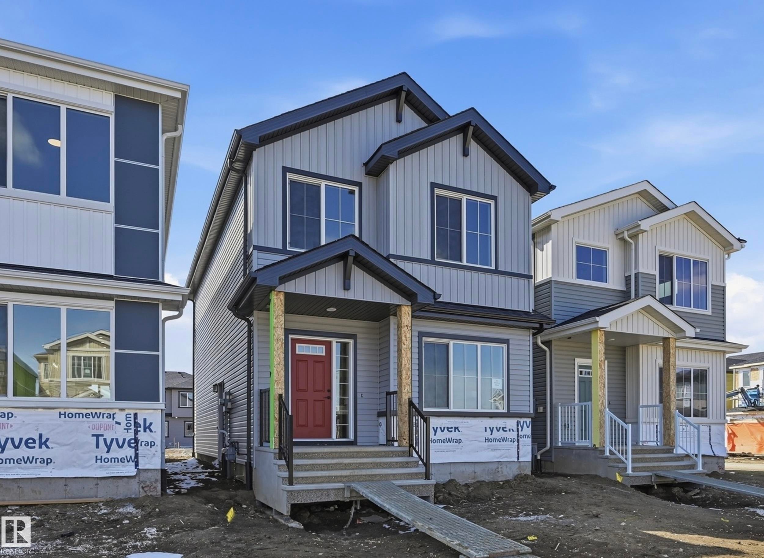 243 Wattle Road, Leduc, AB - Outdoor With Facade