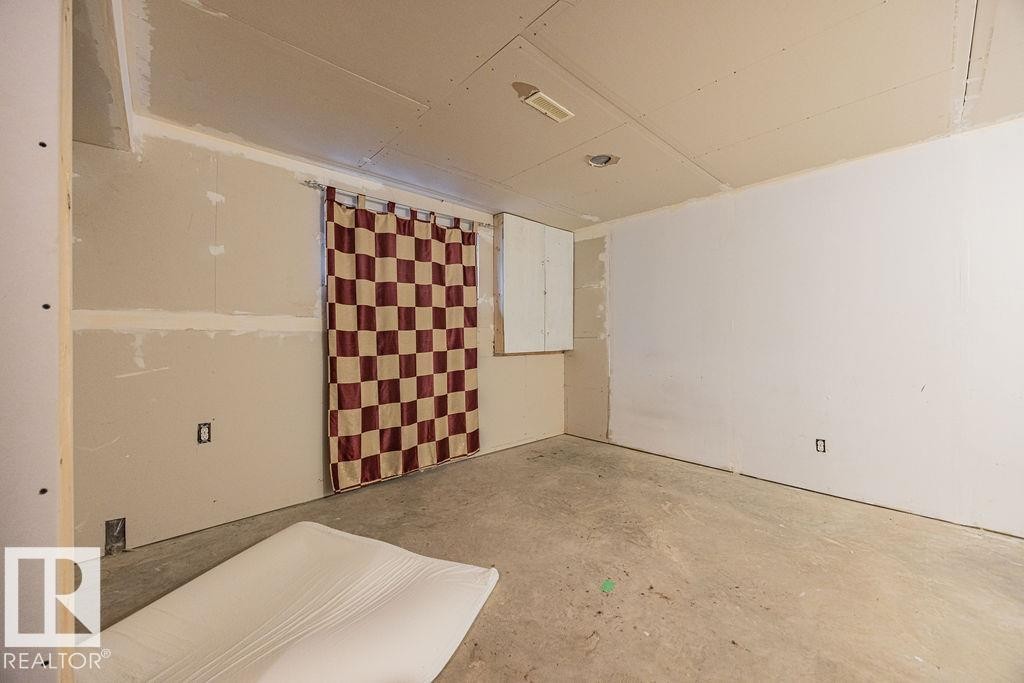 Unfinished interior space with drywall installation in progress - 14 9350 211 Street, Edmonton, AB - Indoor Photo Showing Other Room