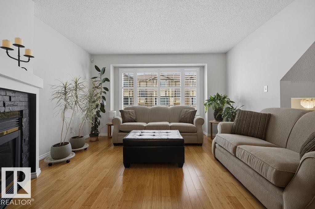17624 96 Avenue, Edmonton, AB - Indoor Photo Showing Living Room With Fireplace