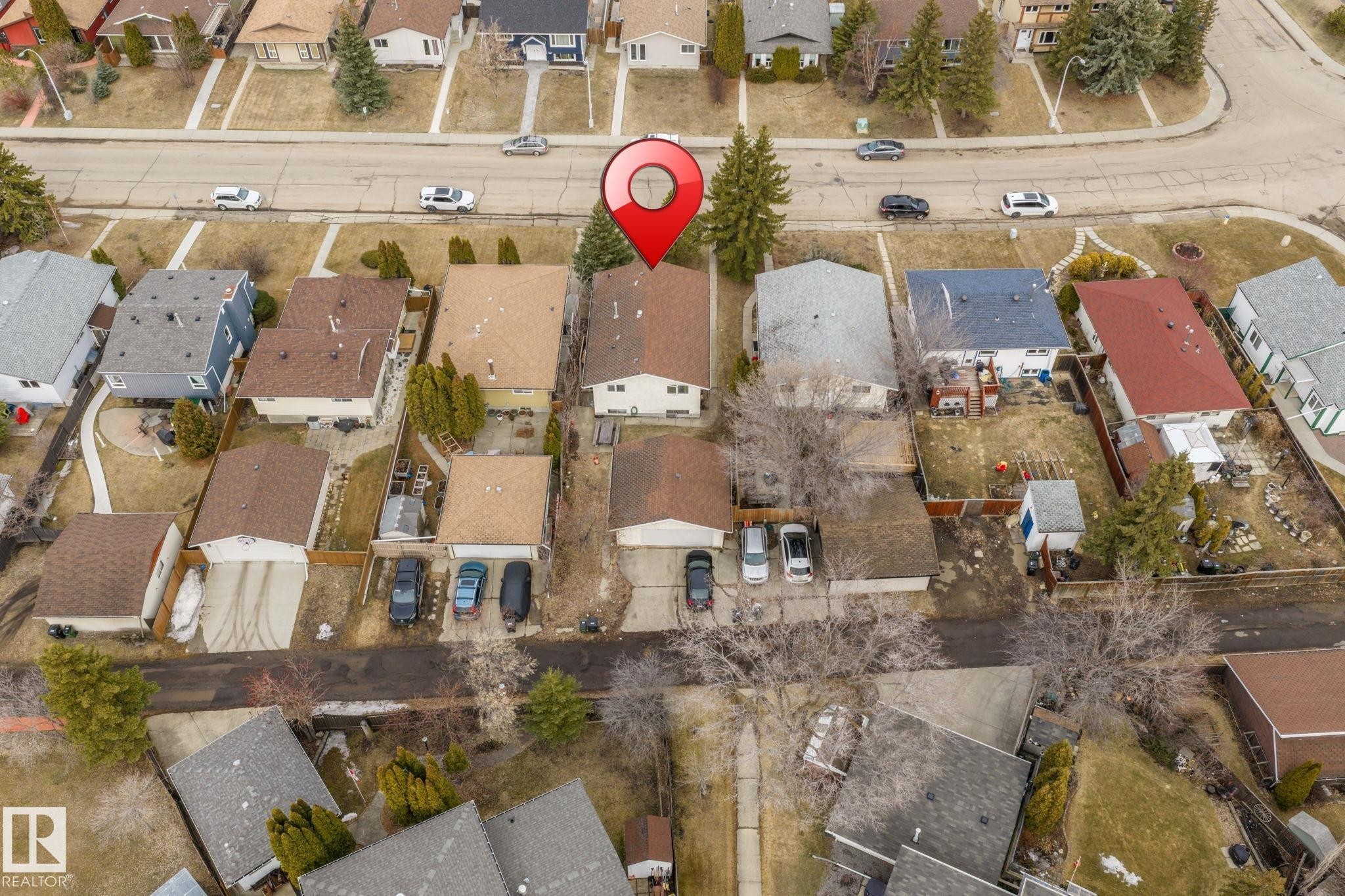 Aerial perspective of a residential property within a neighborhood setting, featuring a rear yard space - 1566 Lakewood Road Nw, Edmonton, AB - Outdoor With View