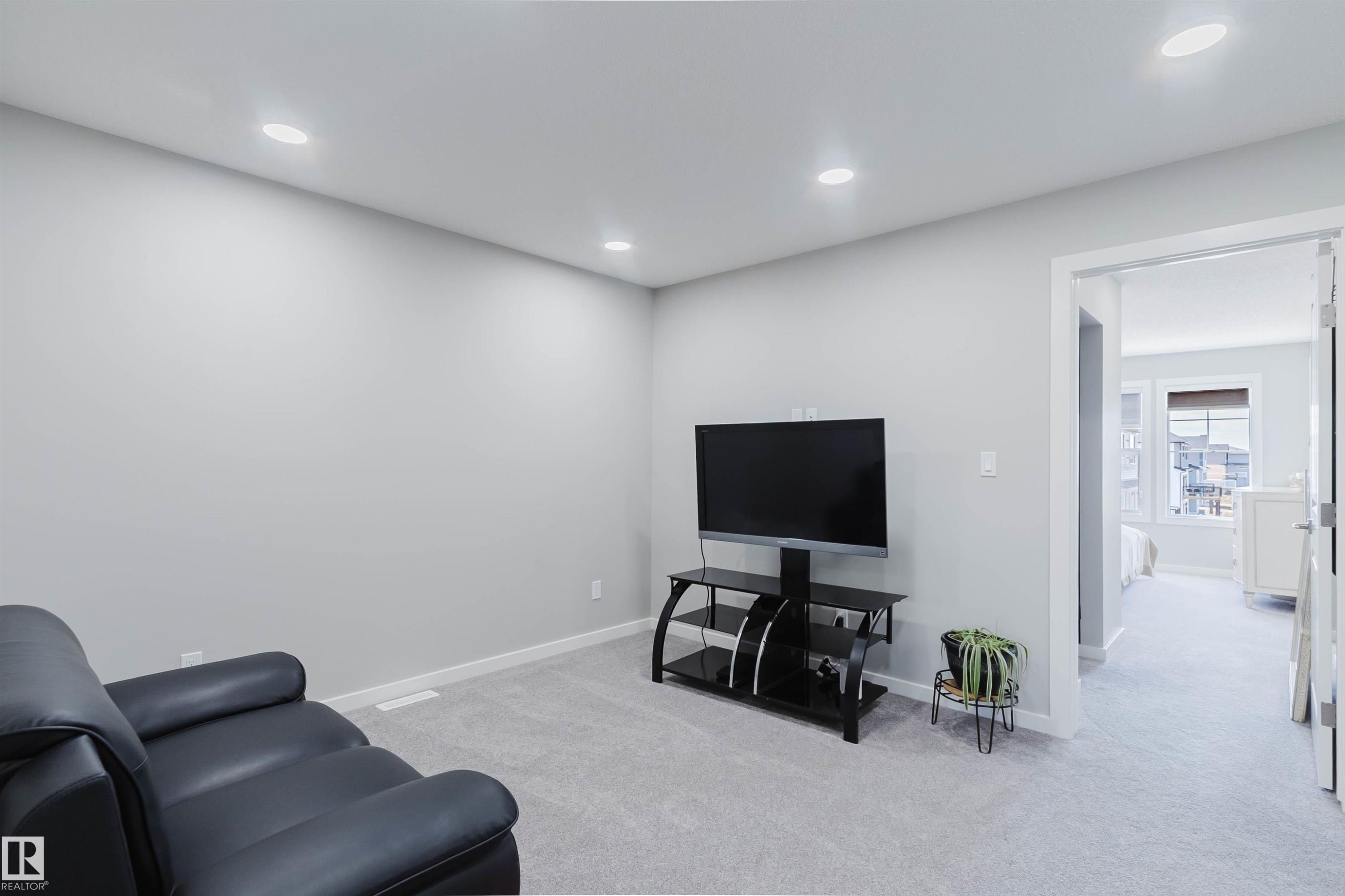 Carpeted room with recessed lighting and light gray walls - 343 Edgemont Drive, Edmonton, AB - Indoor