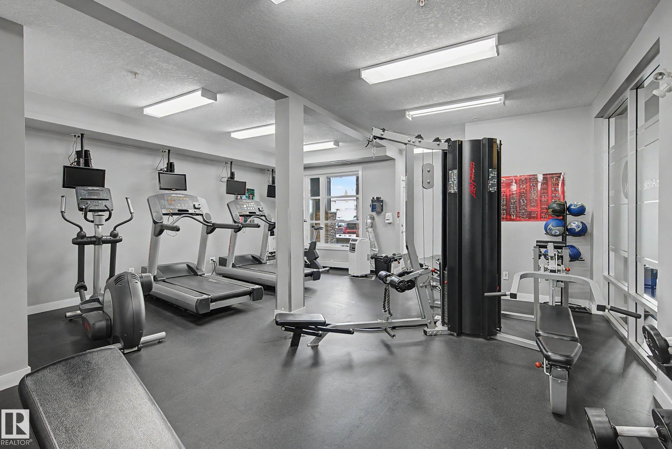 123 2584 Anderson Way, Edmonton, AB - Indoor Photo Showing Gym Room