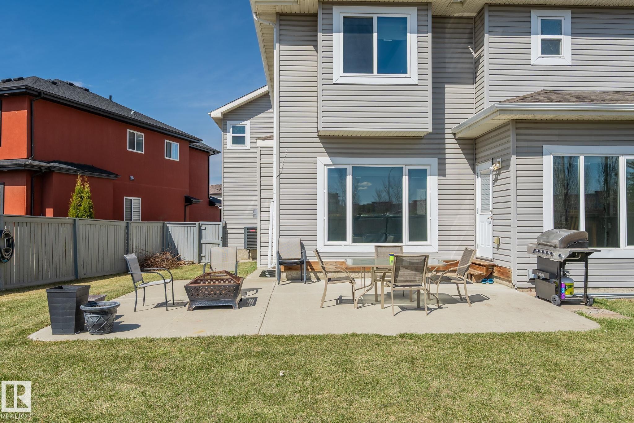 Expansive concrete patio with direct access to the interior - 731 57 Street Sw, Edmonton, AB - Outdoor With Exterior