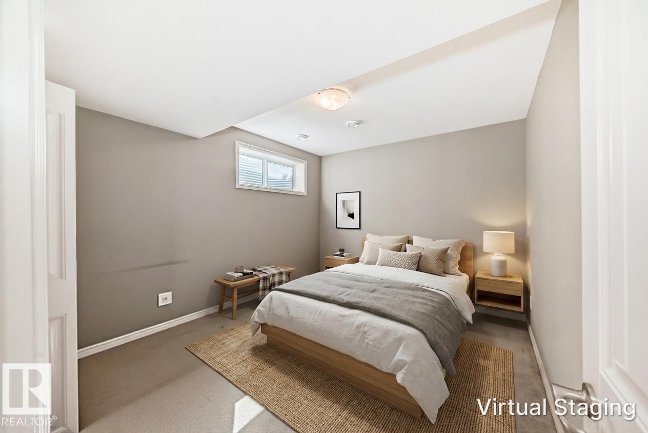 Carpeted room with a recessed ceiling, a single window with blinds, and a built-in ceiling light fixture - 6723 19 Avenue, Edmonton, AB - Indoor Photo Showing Bedroom