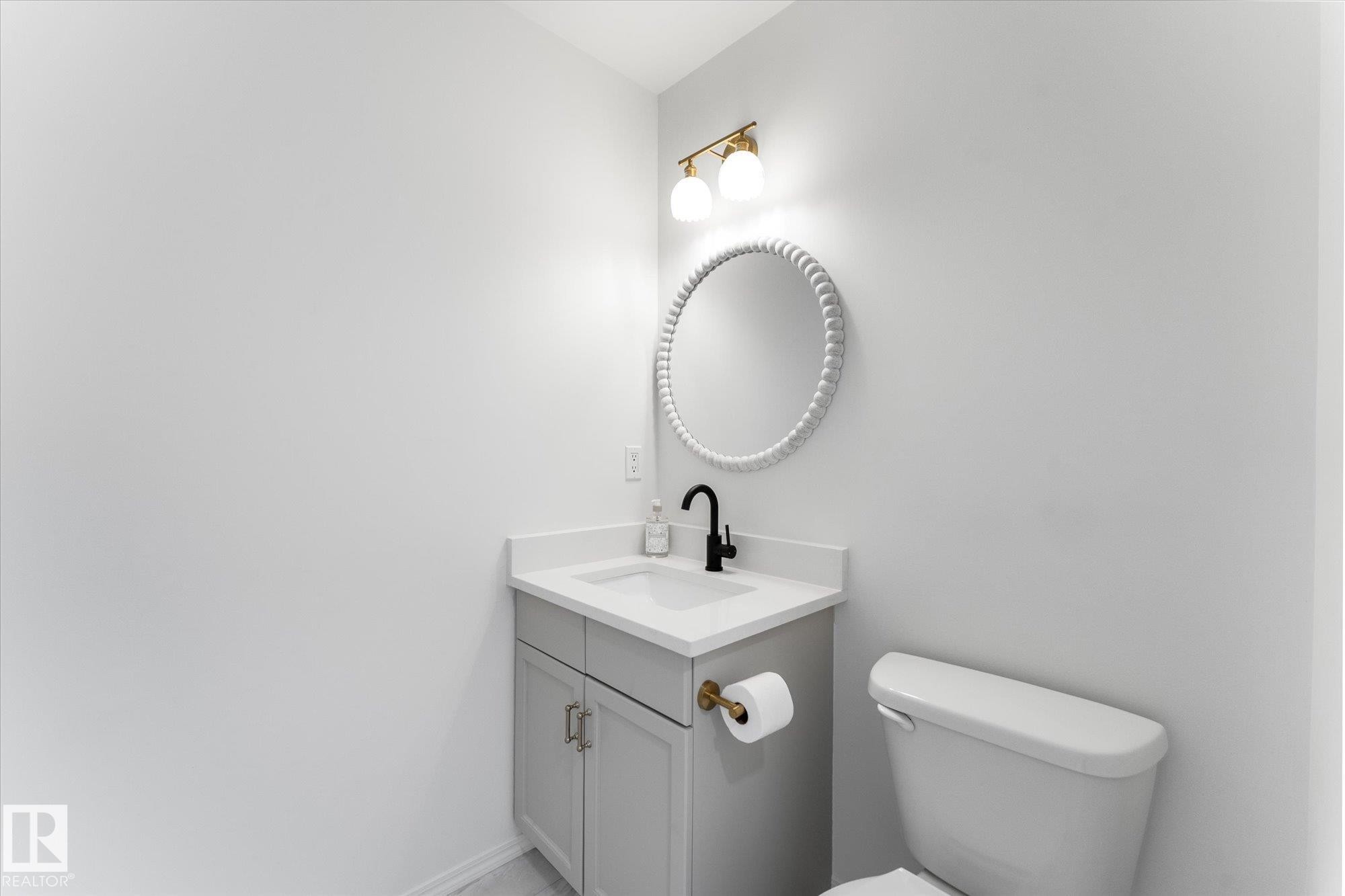 Contemporary vanity with a white countertop and integrated sink - 326 Silver Berry Road, Edmonton, AB - Indoor Photo Showing Bathroom