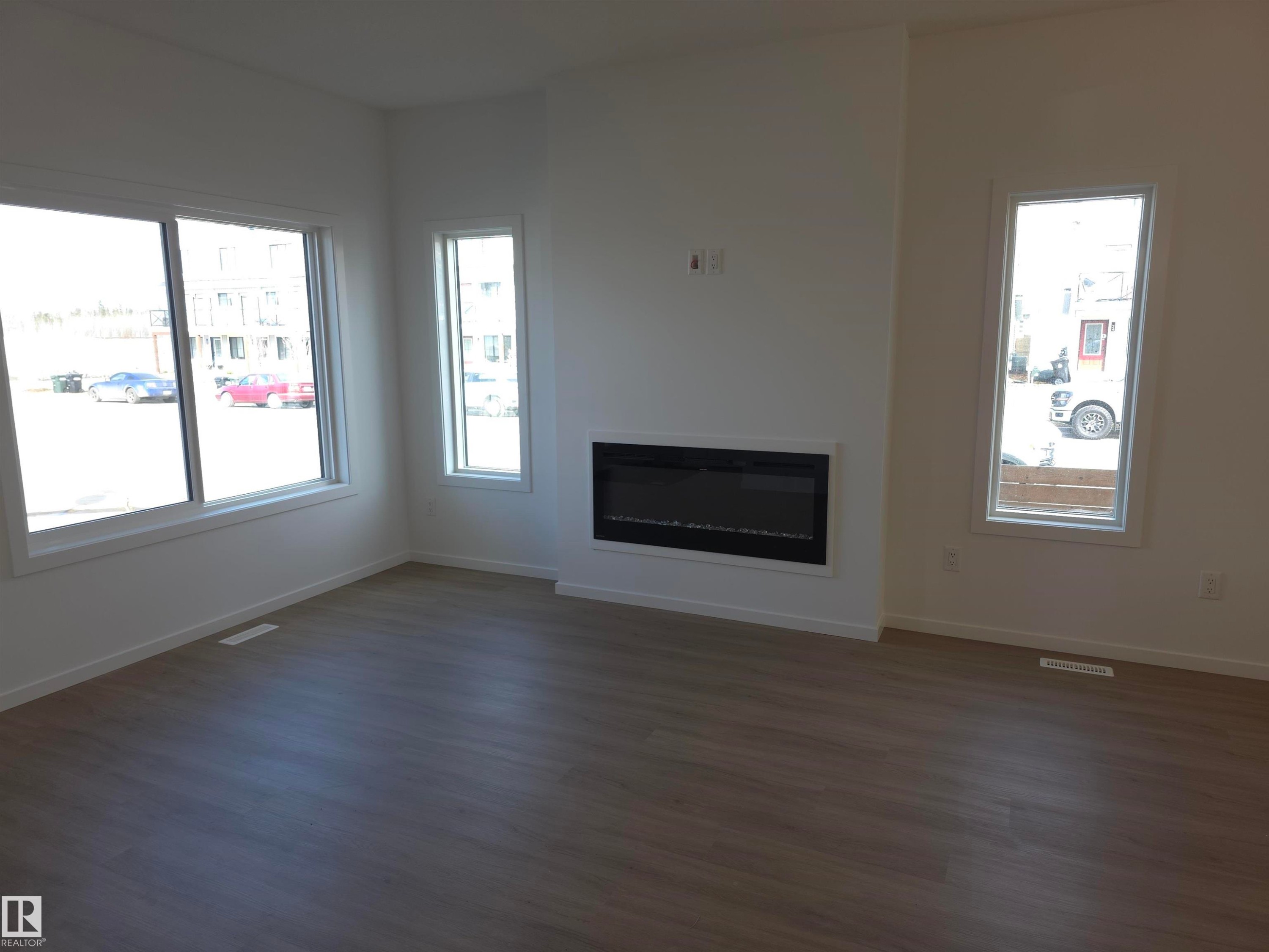 43 Eton Link, Spruce Grove, AB - Indoor Photo Showing Living Room With Fireplace