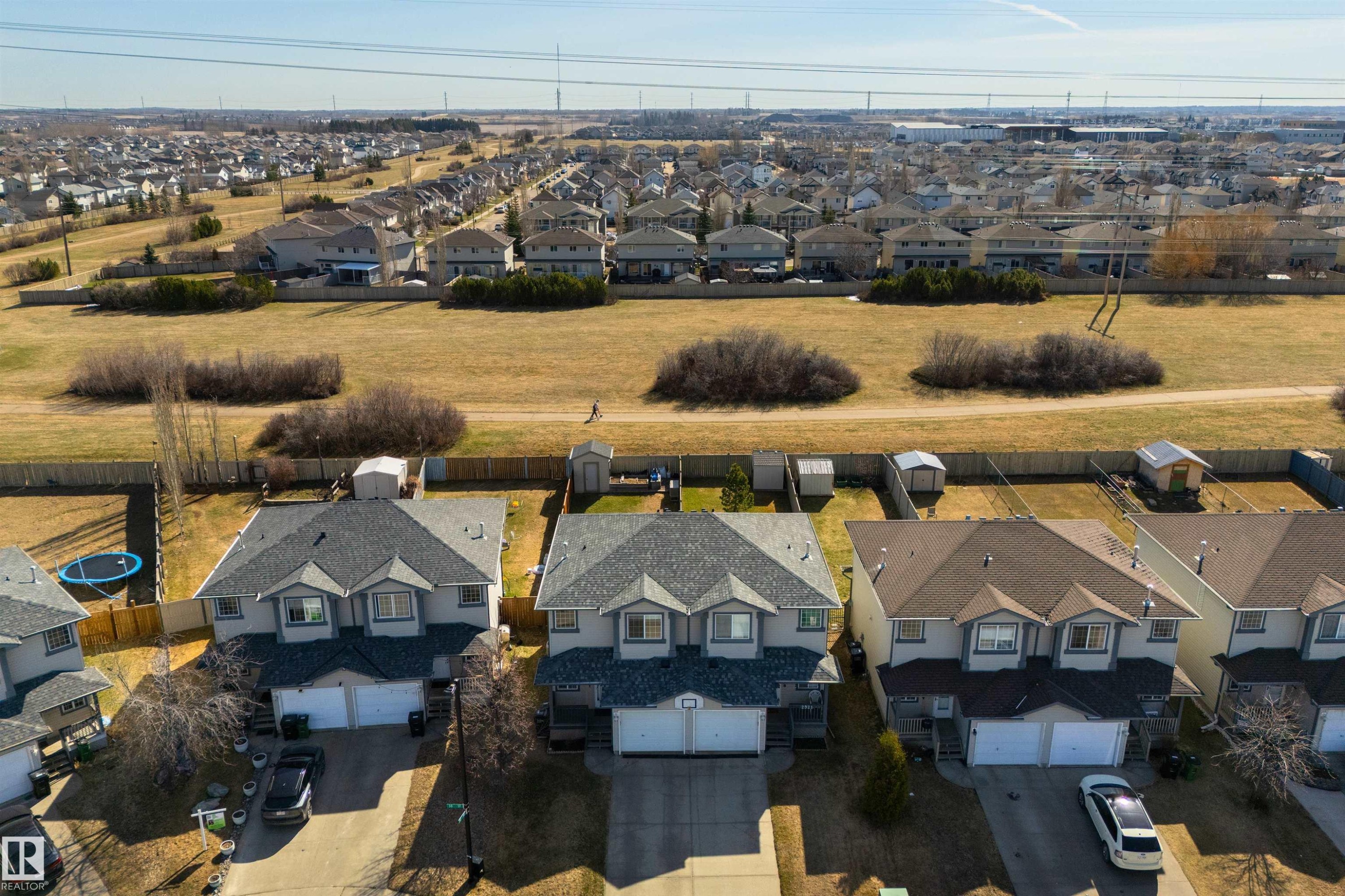 Row of detached homes with attached garages - 2923 30 Street, Edmonton, AB - Outdoor