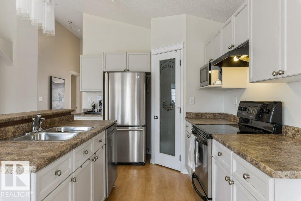 94 Eastgate Way, St. Albert, AB - Indoor Photo Showing Kitchen With Double Sink