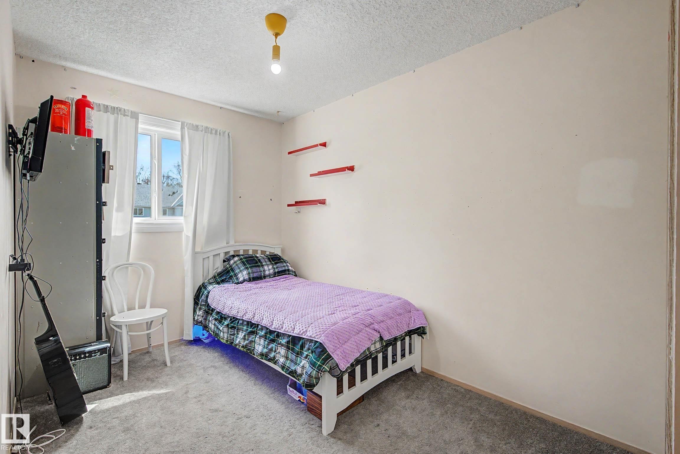 129 5 Aberdeen Way, Stony Plain, AB - Indoor Photo Showing Bedroom