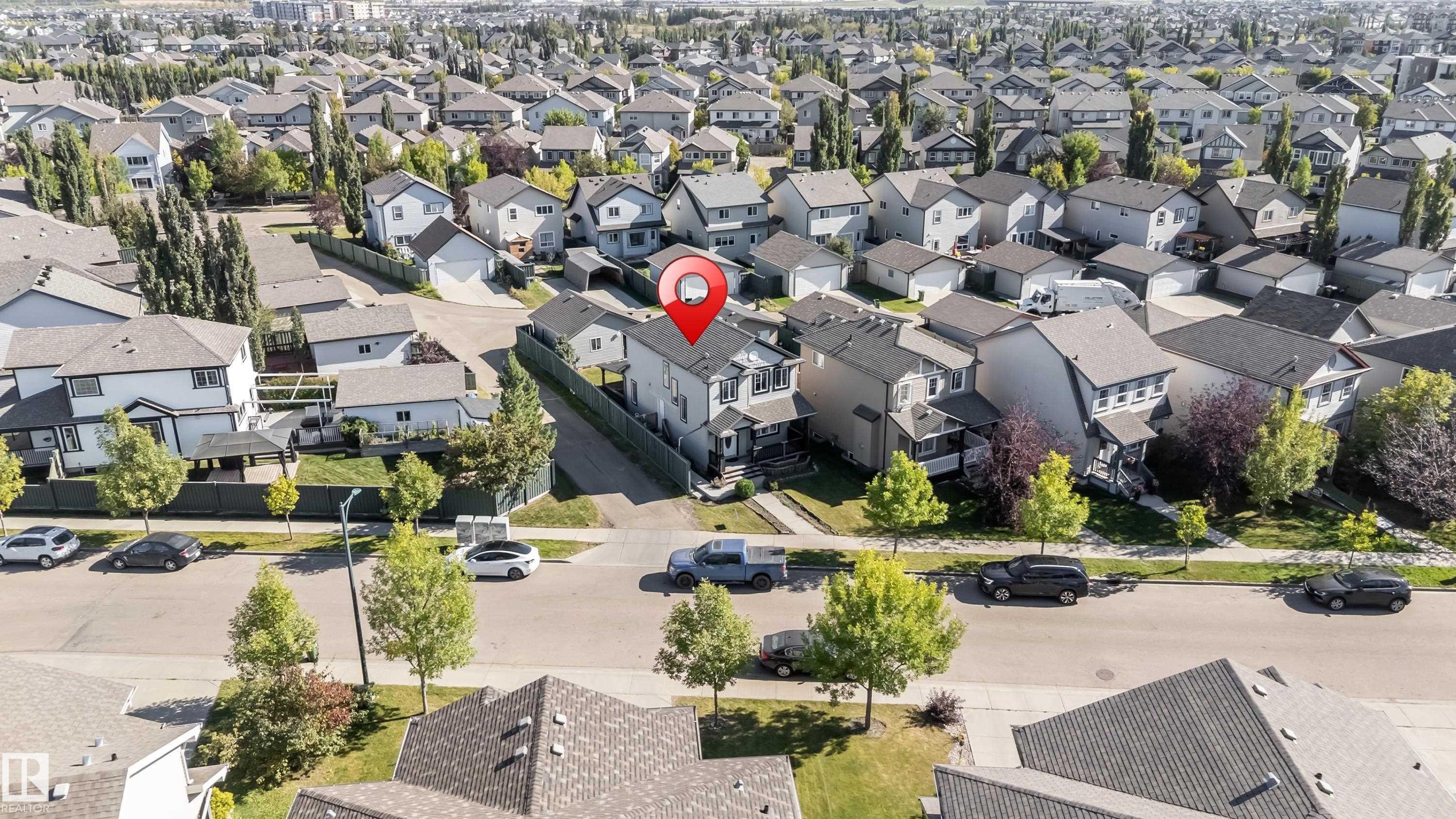 Residential neighborhood featuring numerous detached homes with varying architectural styles - 1921 119A Street, Edmonton, AB