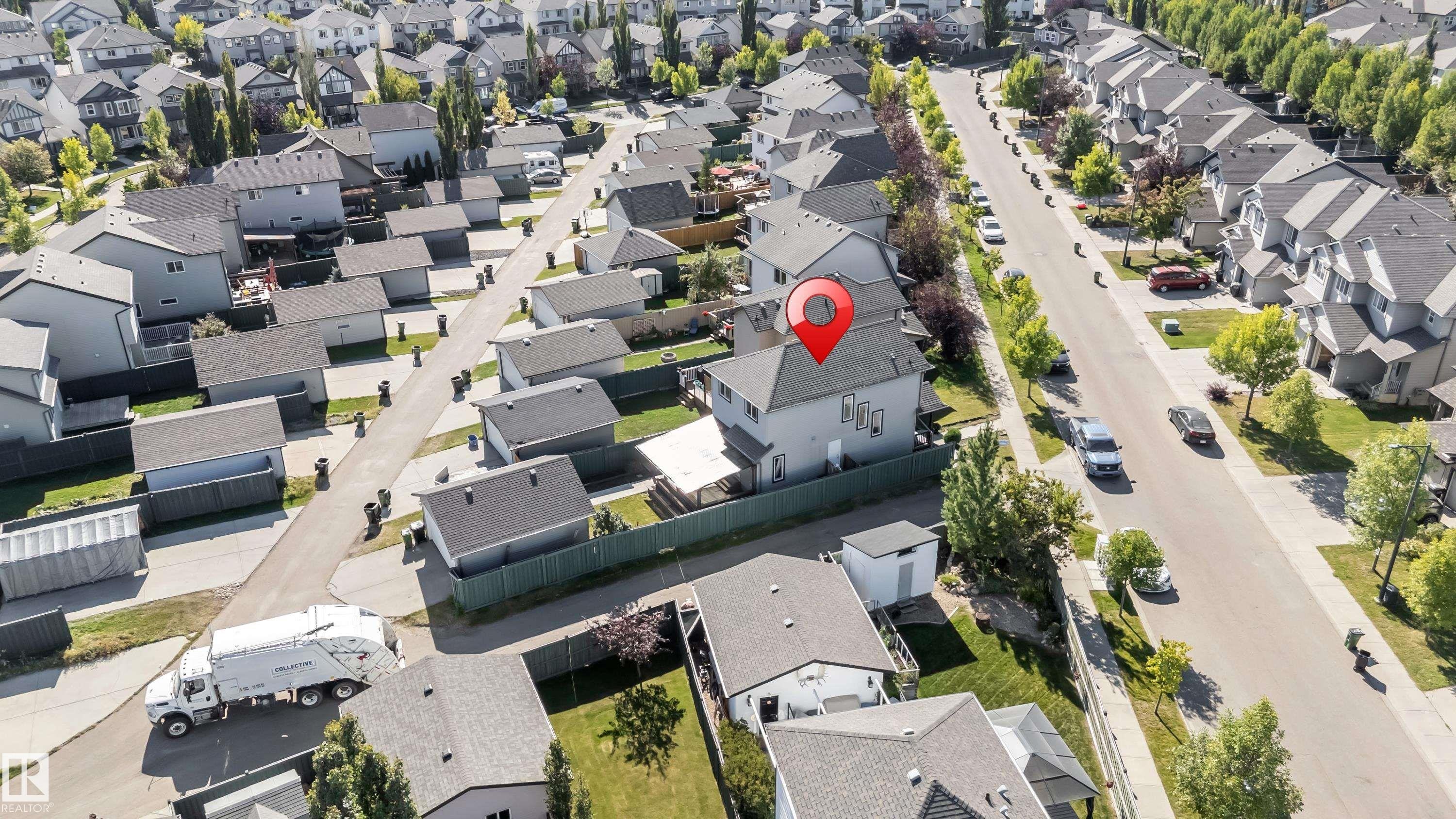 Light grey two-story residence with white trim - 1921 119A Street, Edmonton, AB