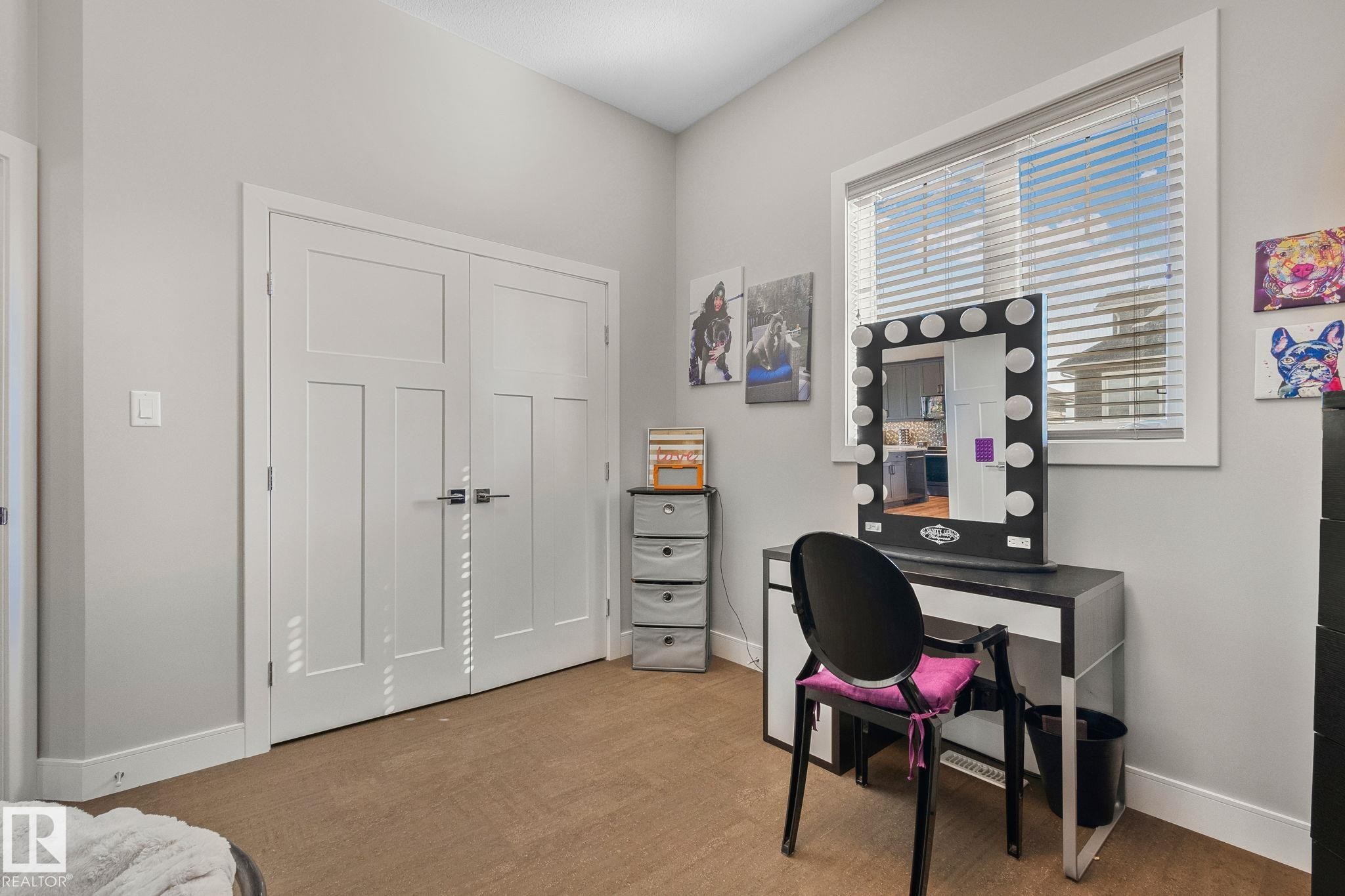 Dual panel doors with brushed nickel hardware - 67 Enchanted Way Nw, St. Albert, AB - Indoor