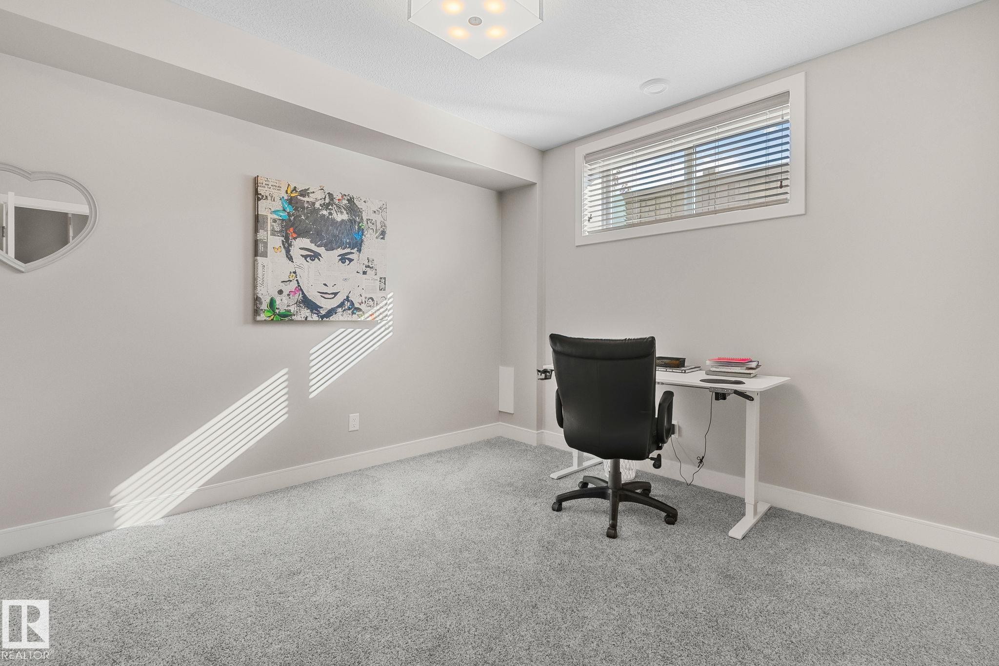 Room featuring light gray carpet flooring, white baseboards, and neutral wall paint - 67 Enchanted Way Nw, St. Albert, AB - Indoor