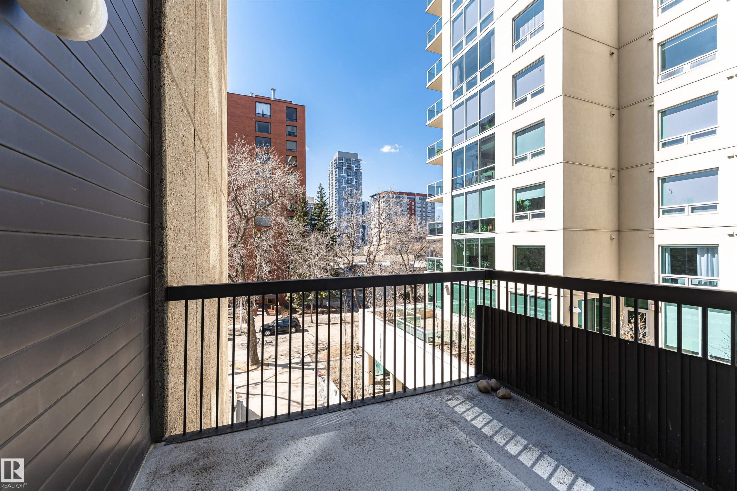 Concrete balcony with black metal railings - 407 10045 118 Street, Edmonton, AB - Outdoor With Balcony