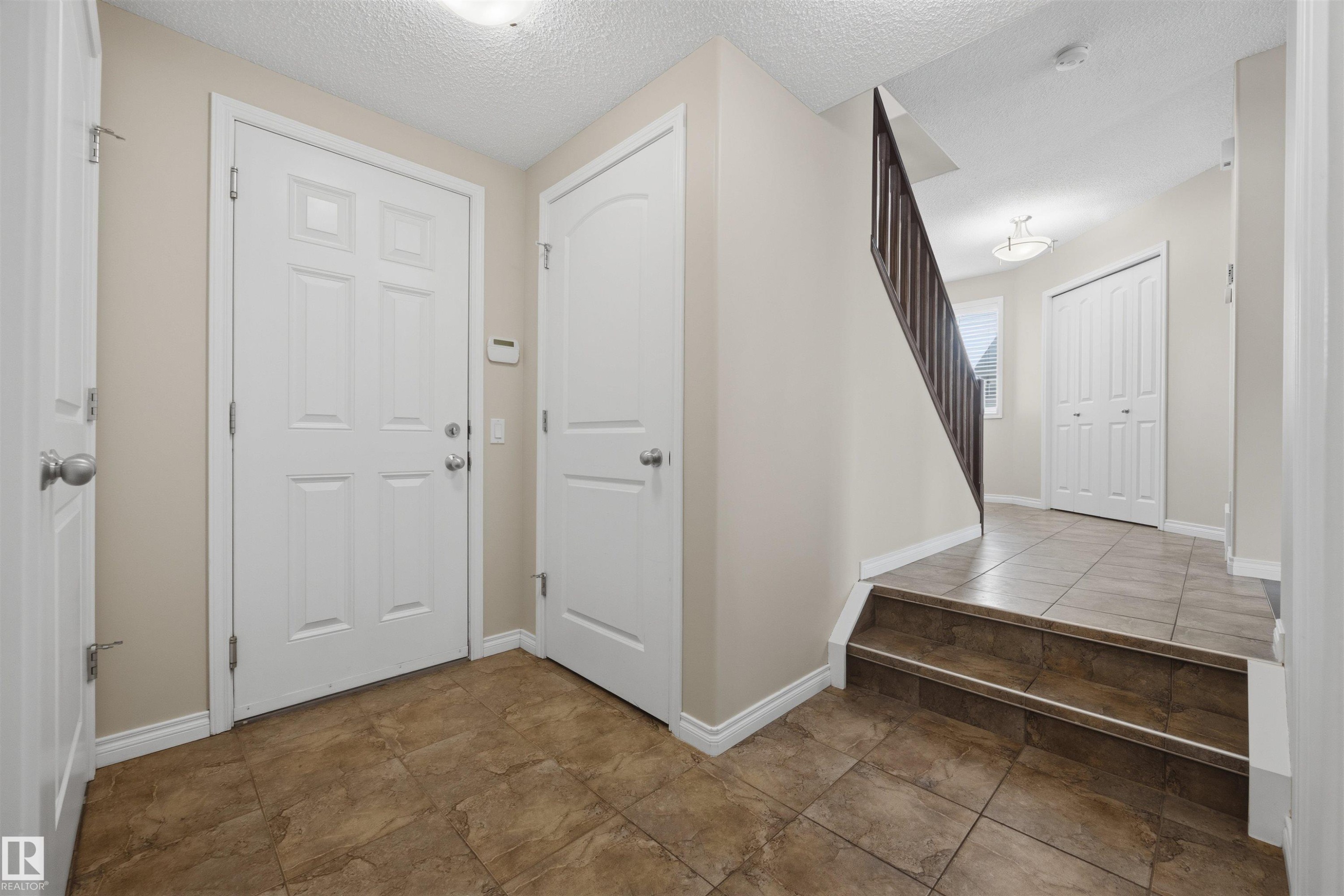 Main level hallway from the garage. - 20813 96A Avenue, Edmonton, AB - Indoor Photo Showing Other Room